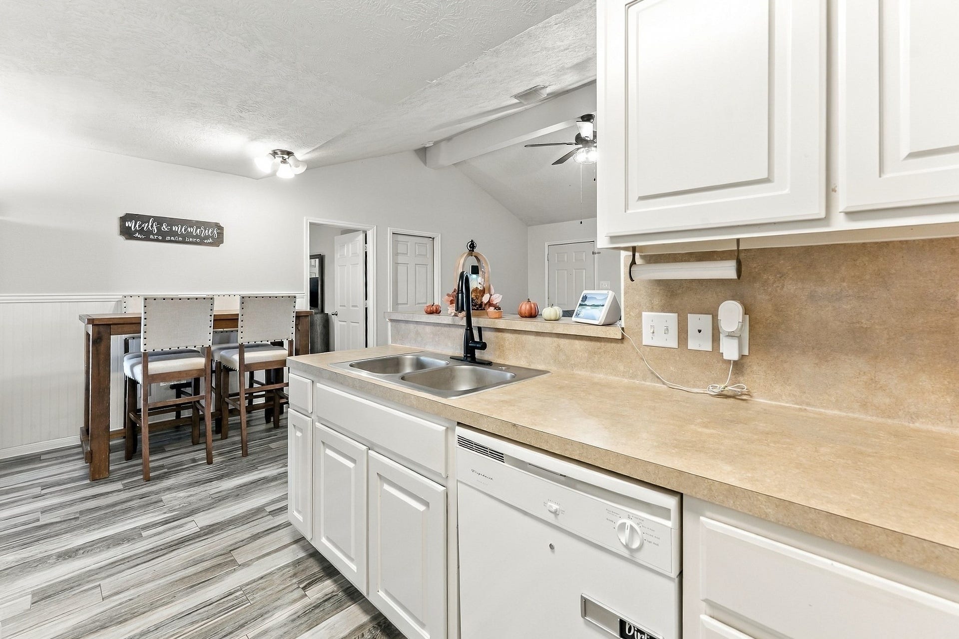 28814 Red River Loop, Spring, TX 77386 You'll love how the kitchen opens directly into the spacious living room, making it easy to cook while staying connected with family or guests. The extended breakfast bar provides additional counter space, while the open floor plan keeps the main gathering areas connected.