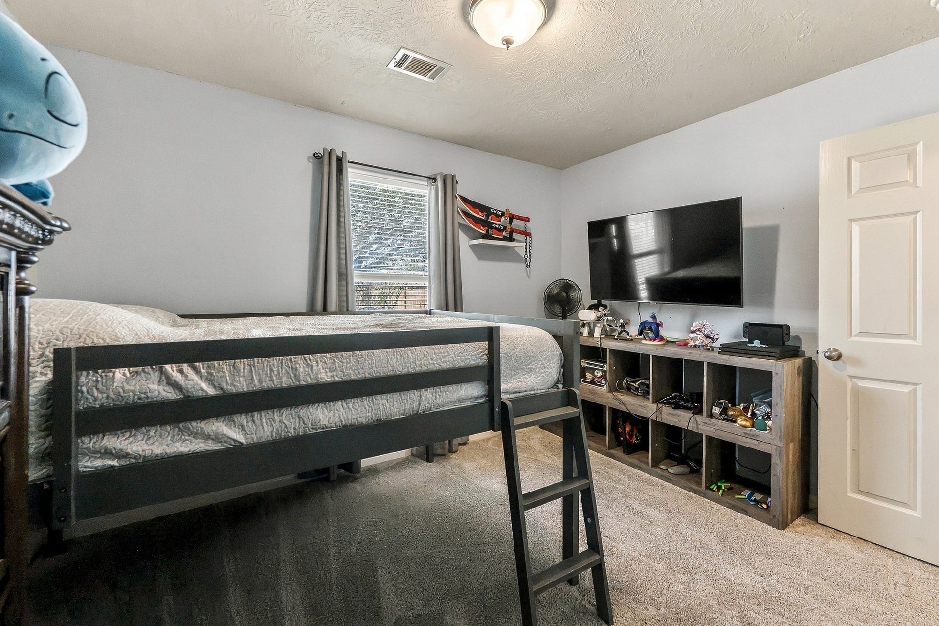 28814 Red River Loop, Spring, TX 77386 Offering plenty of space for both sleeping & additional furniture, this secondary bedroom features brand-new carpeting, a ceiling fan with lighting & a window for natural light. The layout provides plenty of options for making the room your own.