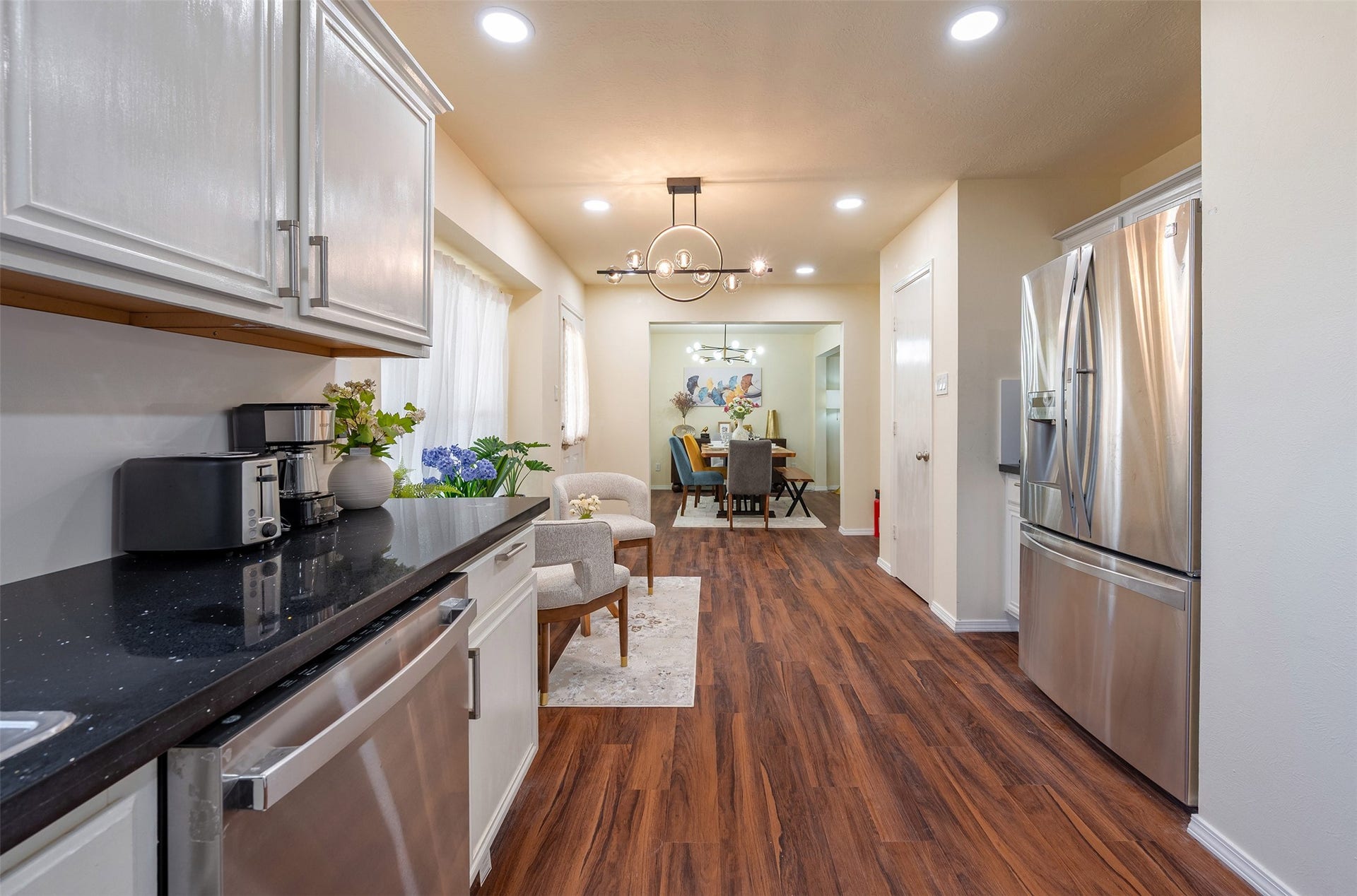 13435 Bishop Way Drive, Houston, TX 77083 Kitchen: Modern, fully-equipped kitchen with ample cabinet space, premium countertops, and a functional layout.