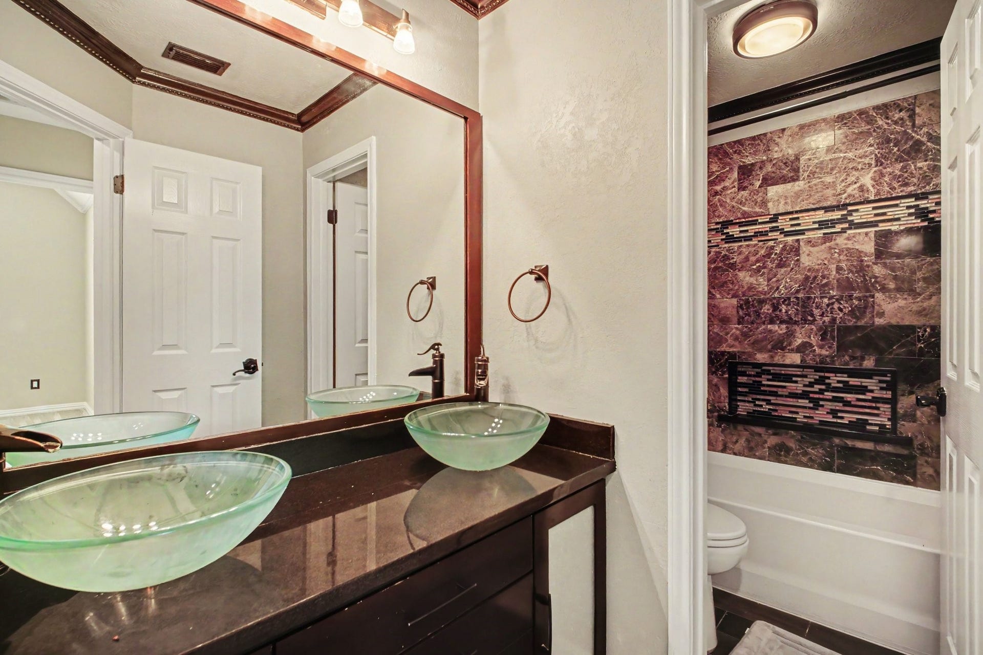 5406 Brook Bend Drive, Sugar Land, TX 77479 Additional full bath on second floor is perfect for larger families or hosting guests