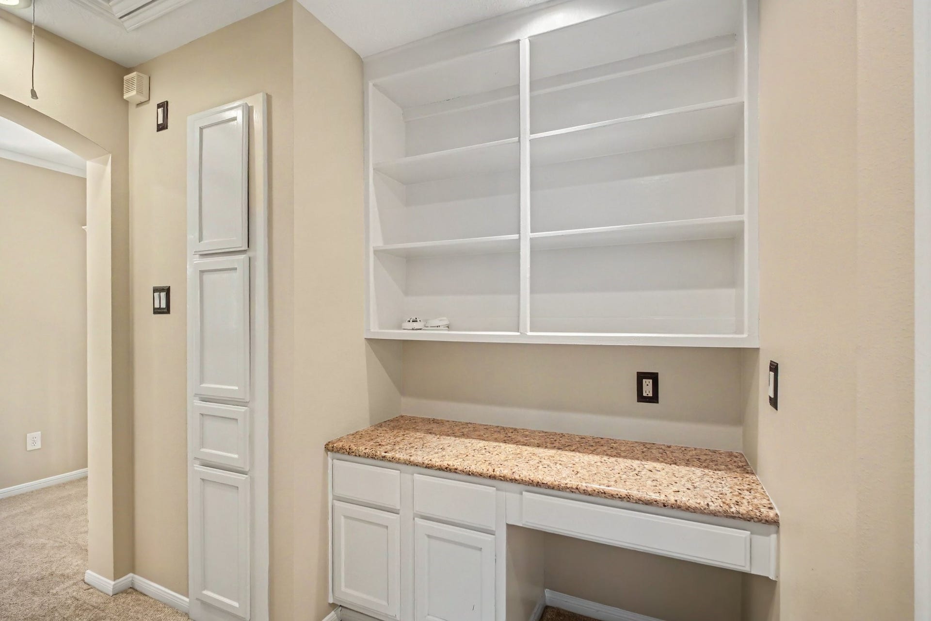 5406 Brook Bend Drive, Sugar Land, TX 77479 A convenient office or desk space is thoughtfully situated near two bedrooms, creating a perfect spot for work, study or everyday organization