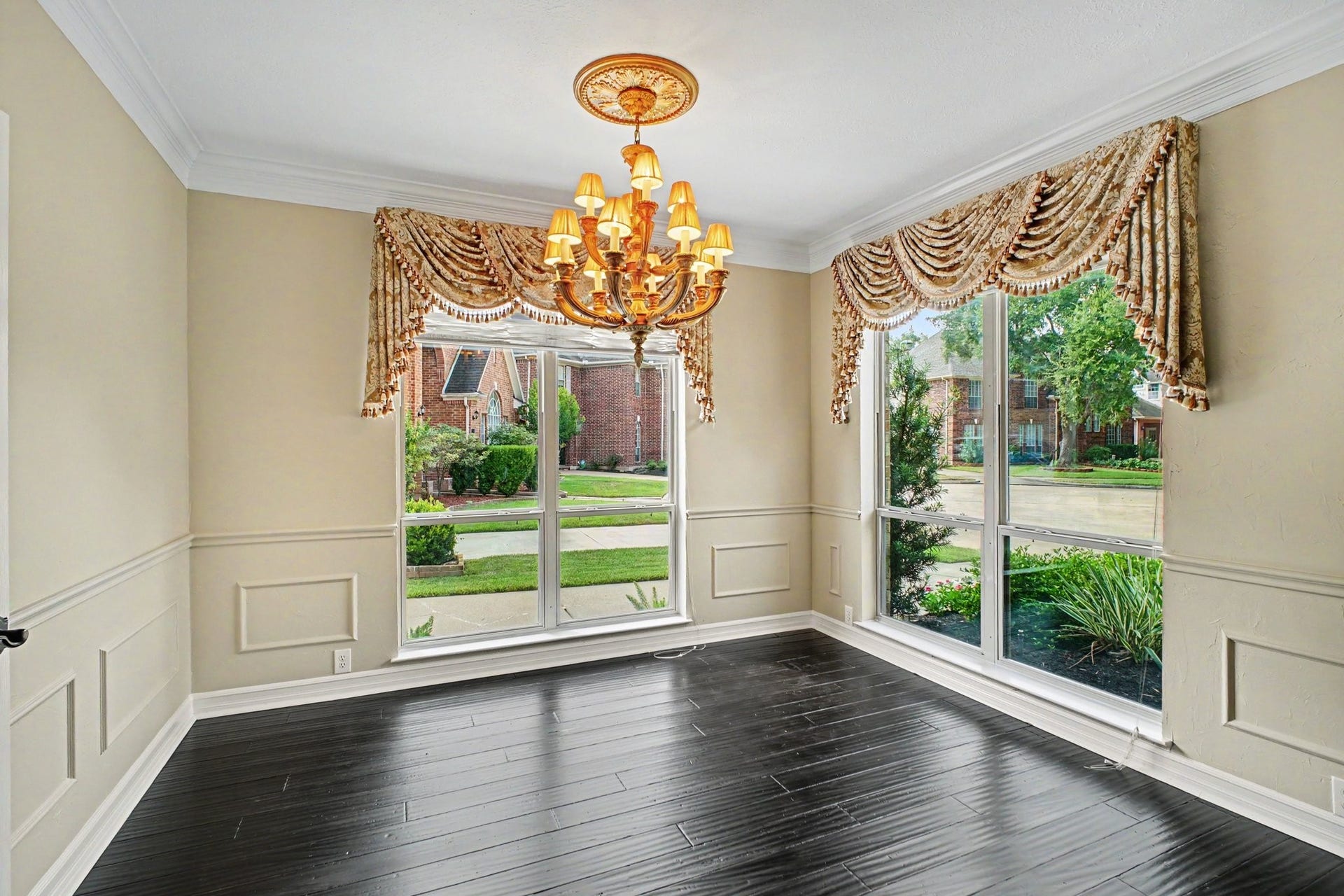 5406 Brook Bend Drive, Sugar Land, TX 77479 Dining room is complete with views of neighborhood and mature trees