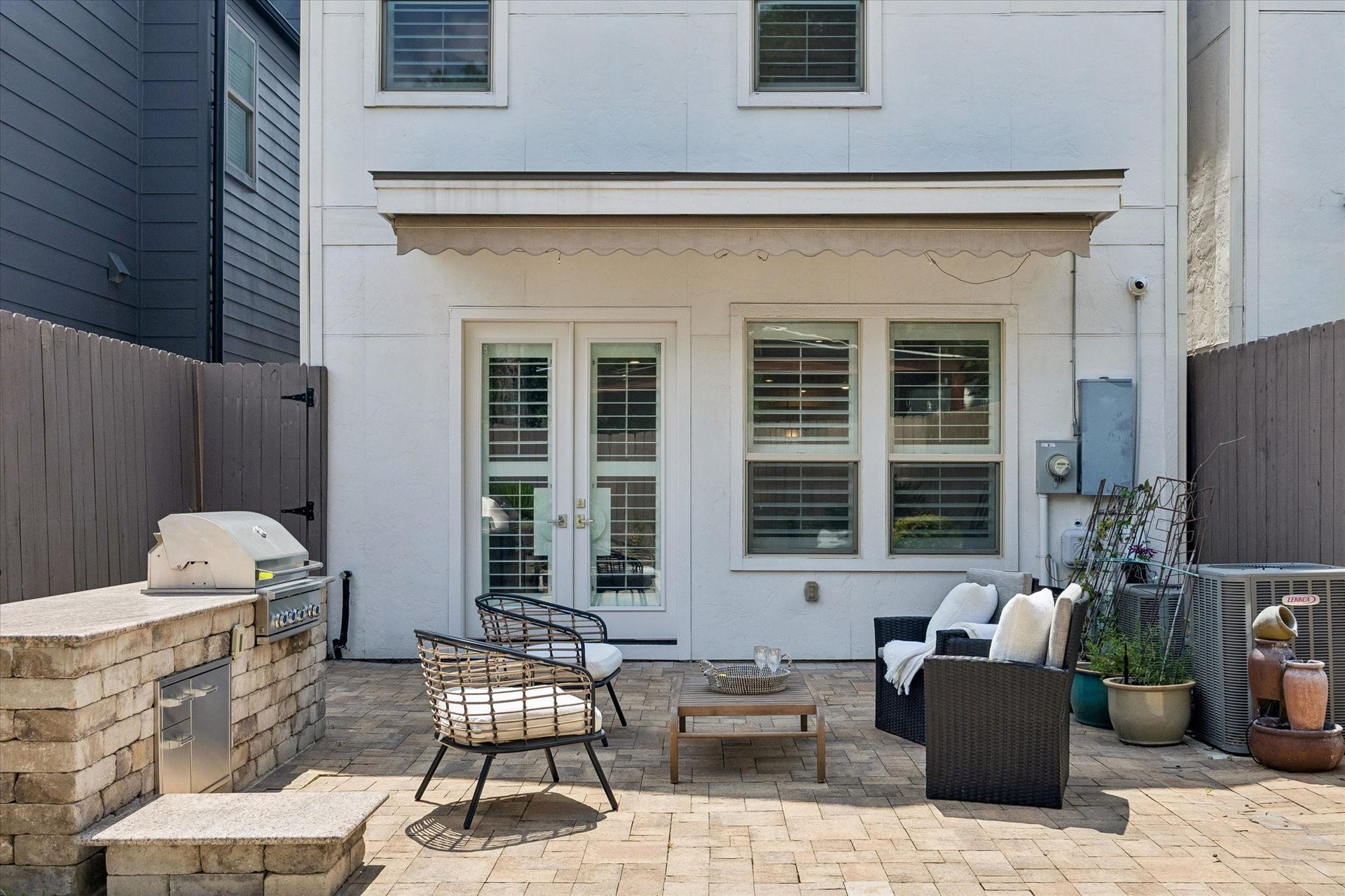 2111 Huldy Street, Houston, TX 77019 A built-in grill paired with a granite countertop offers an ideal setting for outdoor cooking and entertaining.
