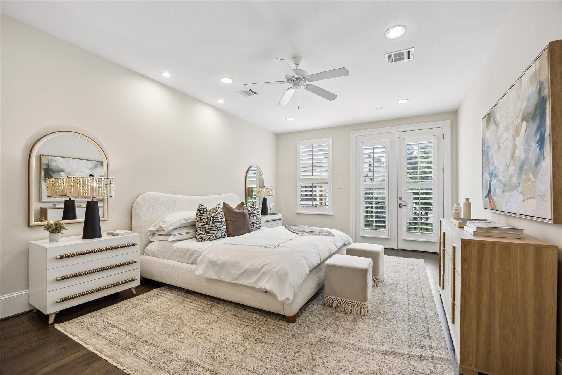 2111 Huldy Street, Houston, TX 77019 Retreat to the spacious primary suite, complete with a private balcony, hardwood floors, recessed lighting, a ceiling fan, and a spa-like ensuite bathroom.