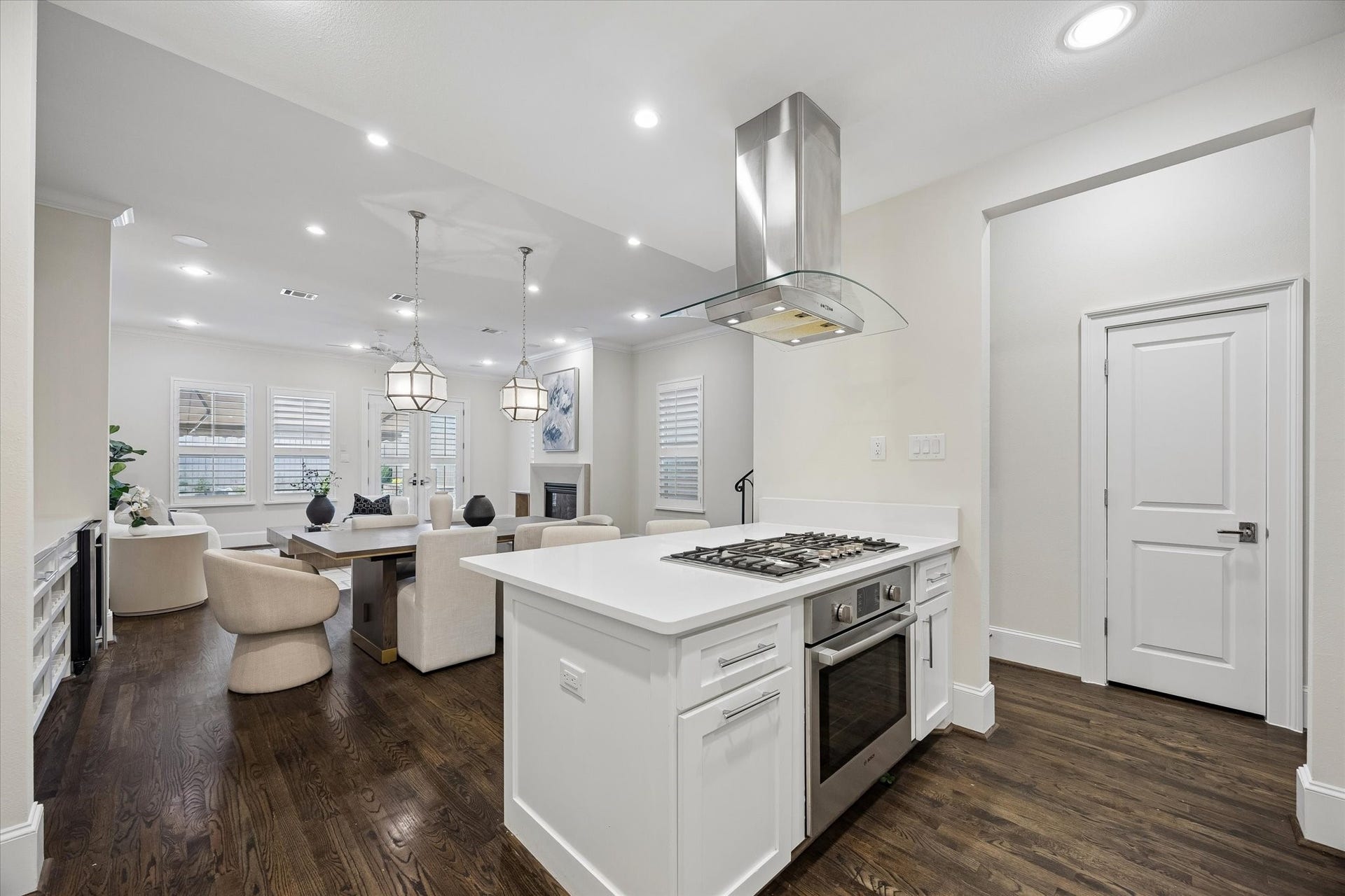 2111 Huldy Street, Houston, TX 77019 The open-concept kitchen flows effortlessly into the dining area and living room, making it perfect for entertaining and everyday living.