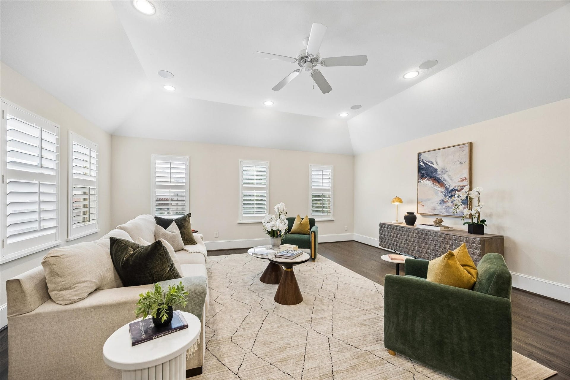 2111 Huldy Street, Houston, TX 77019 Two walls of windows flood the room with natural light.