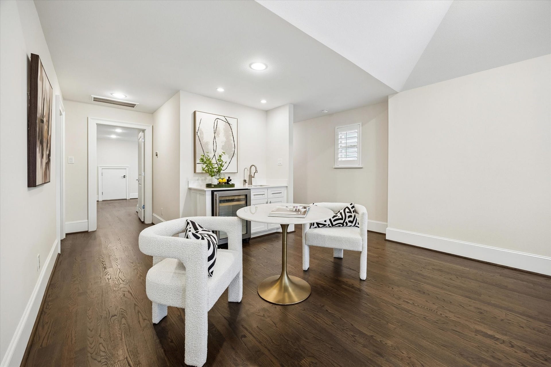2111 Huldy Street, Houston, TX 77019 A wet bar and beverage refrigerator enhance the space, making it perfect for entertaining.