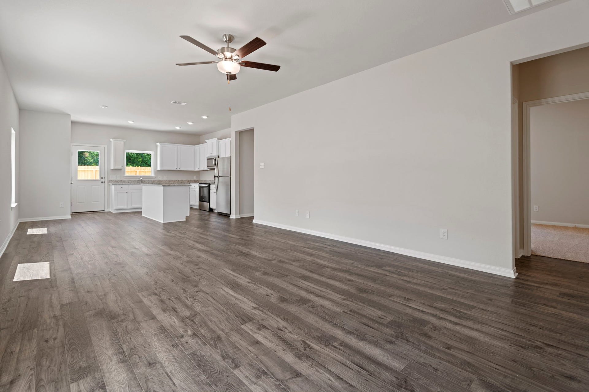 6428 Autumn Equinox Drive, Houston, TX 77048 Gather with family and friends in the living room.