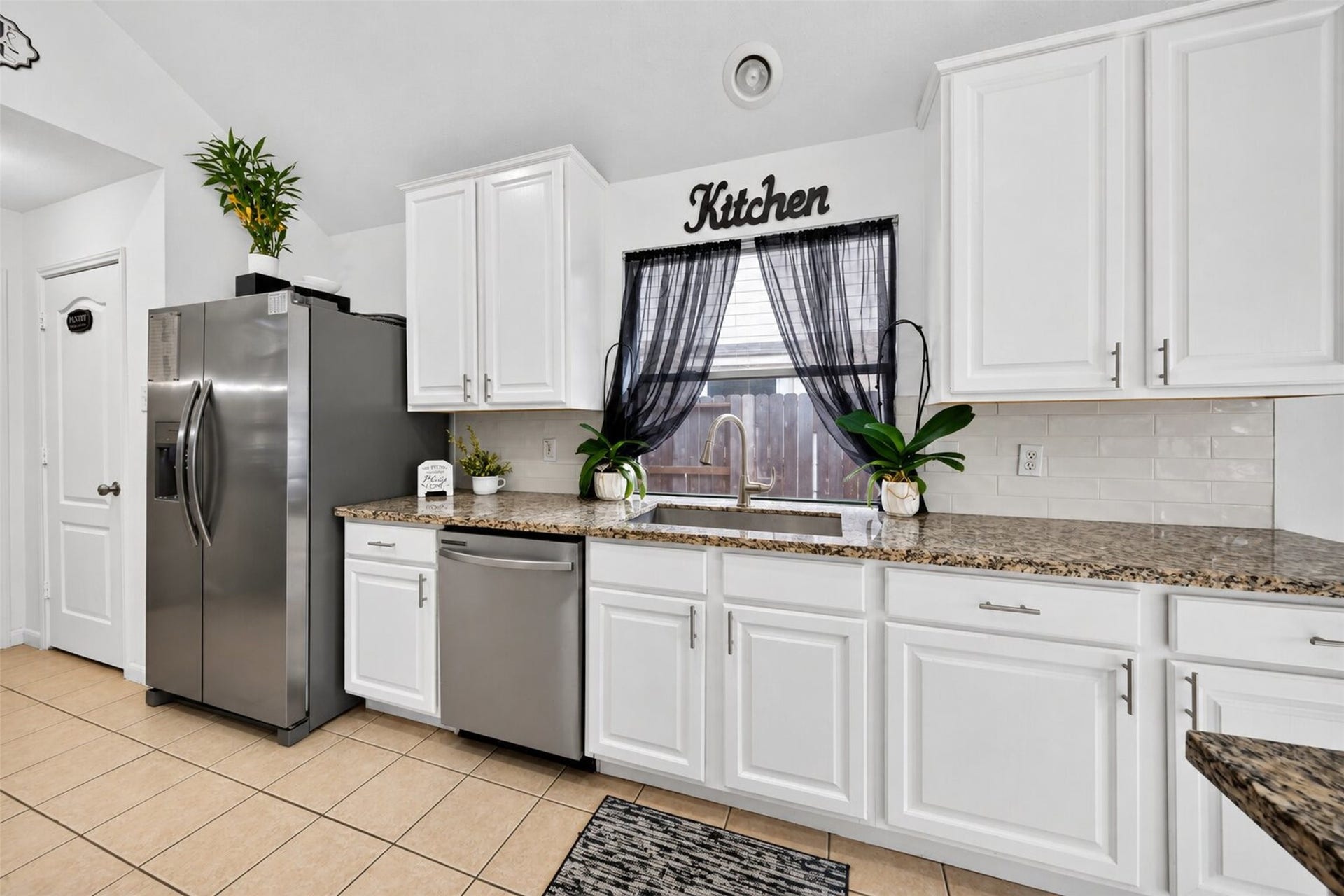11235 Stoney Meadow Drive, Houston, TX 77095 Updated white cabinets and ample counter top space.