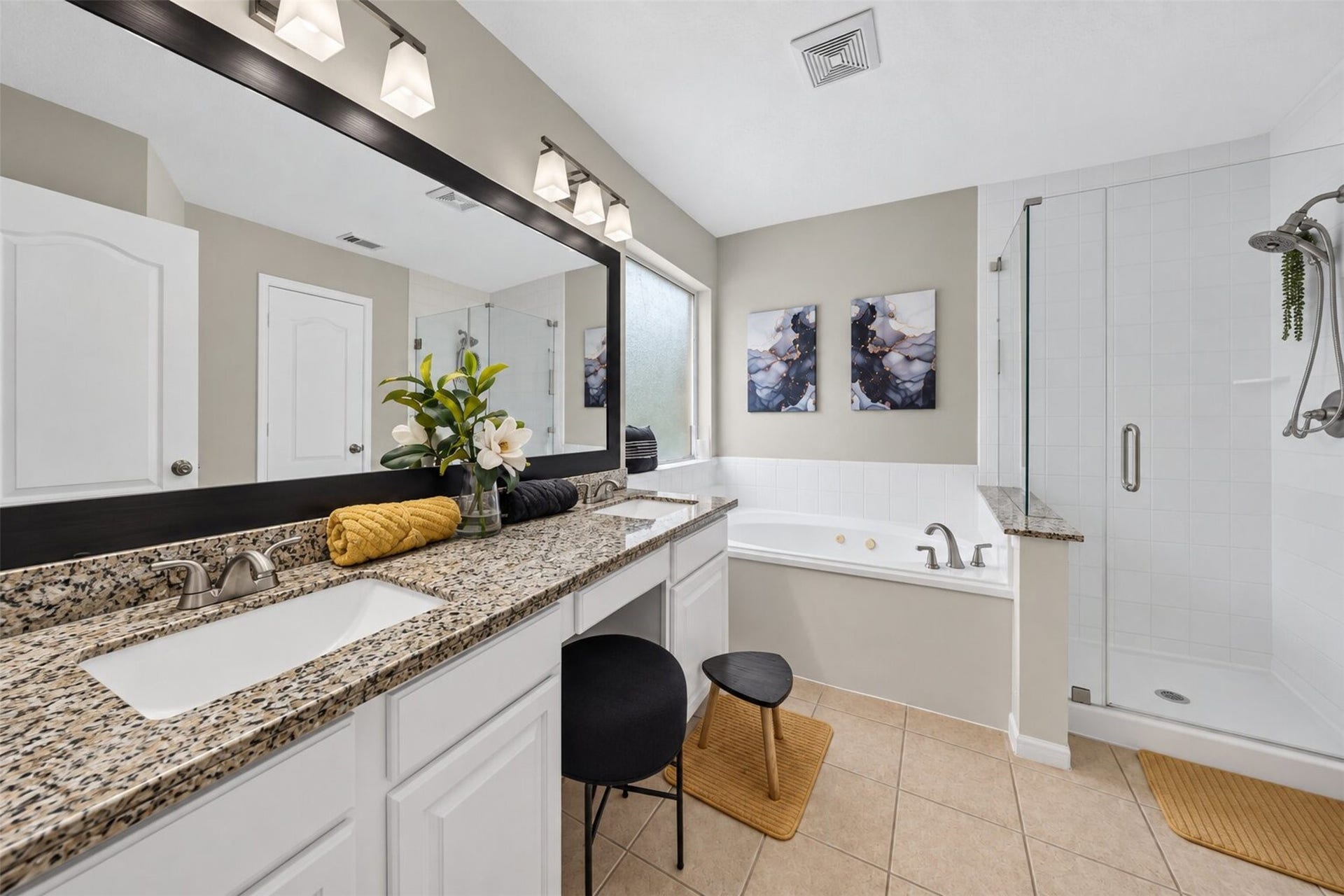 11235 Stoney Meadow Drive, Houston, TX 77095 Primary Bathroom boats deep soaking tub and ample storage space.