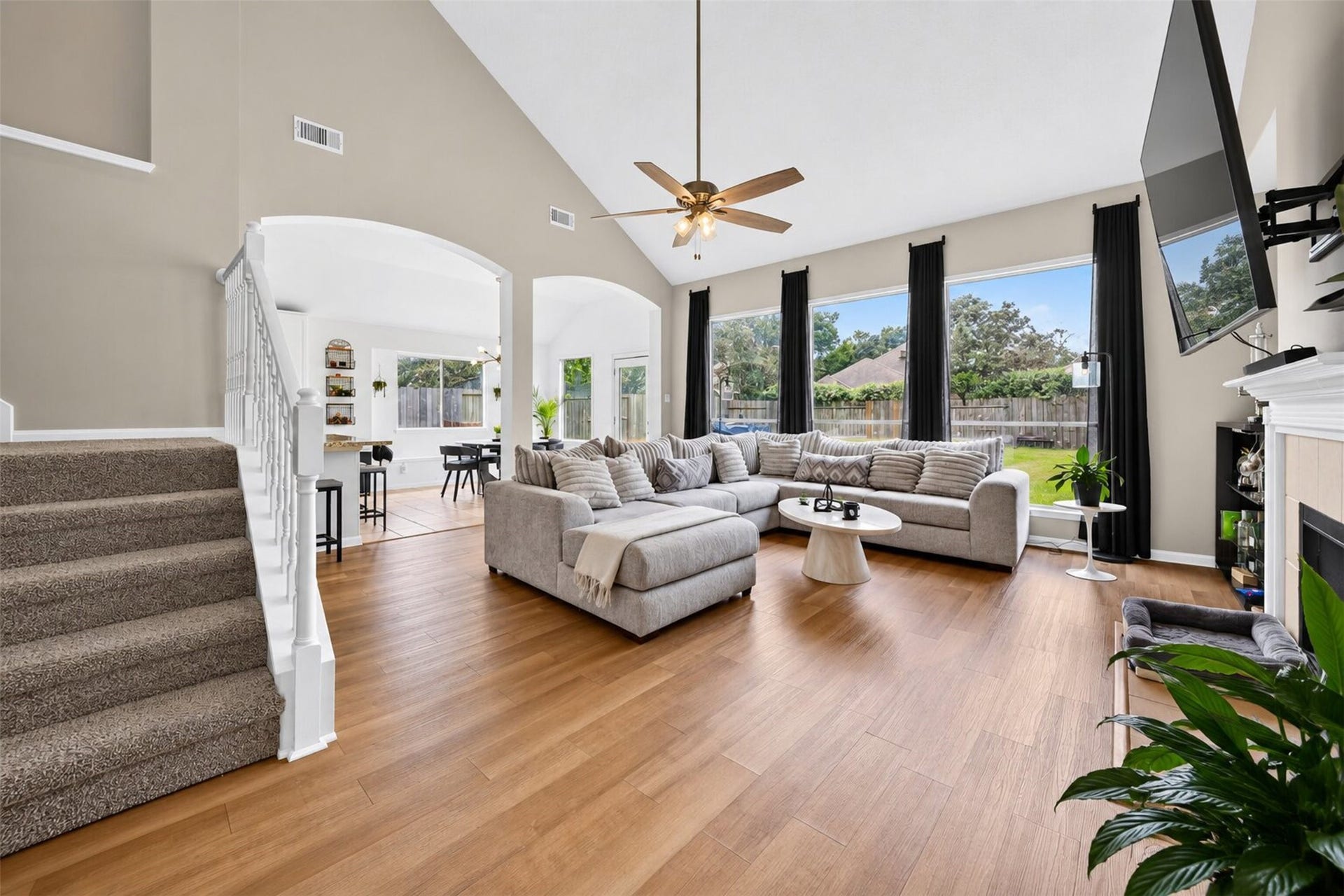 11235 Stoney Meadow Drive, Houston, TX 77095 Living room boats high ceilings and ample natural light.