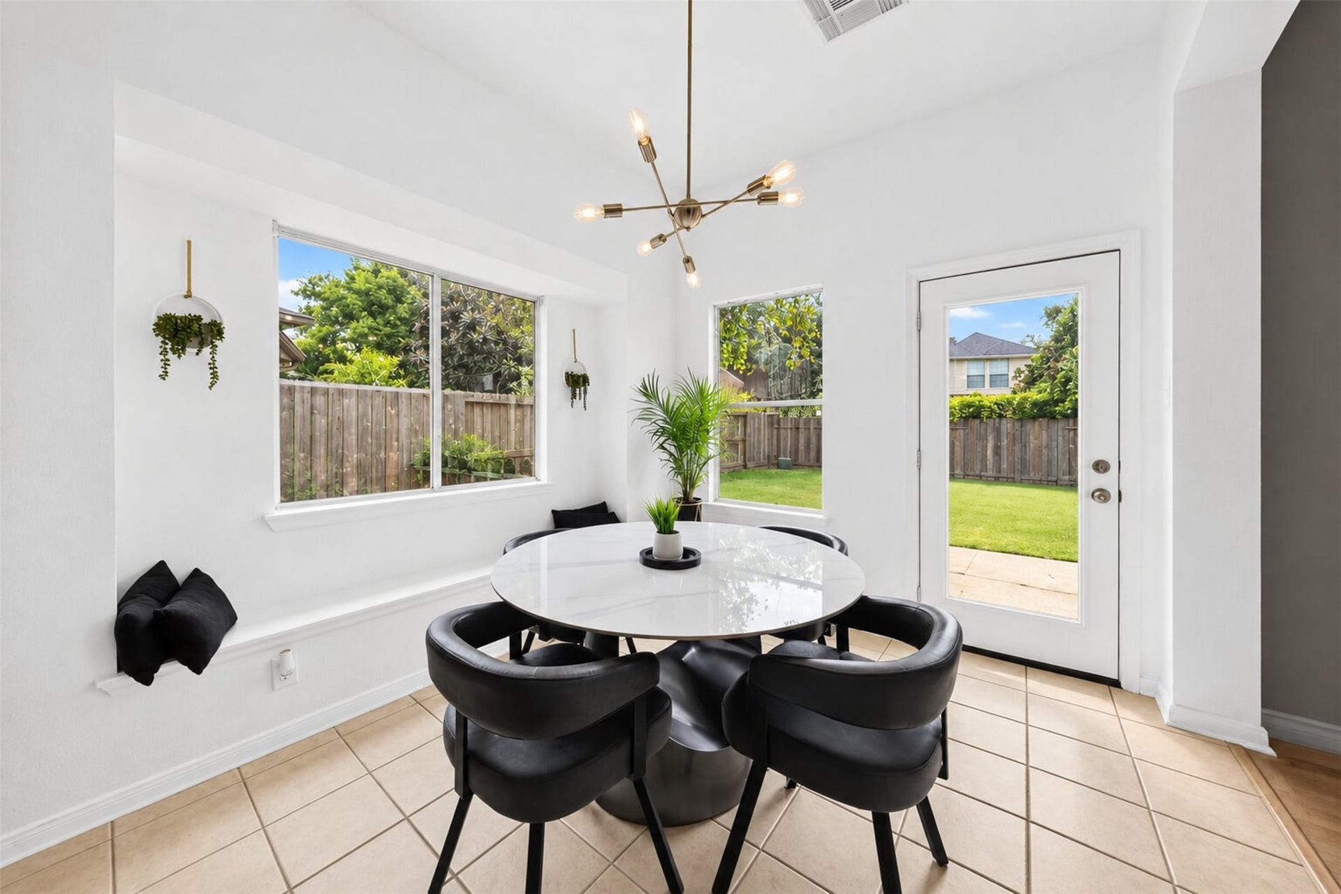 11235 Stoney Meadow Drive, Houston, TX 77095 Dedicated breakfast area with ample natural lighting overlooking the backyard.