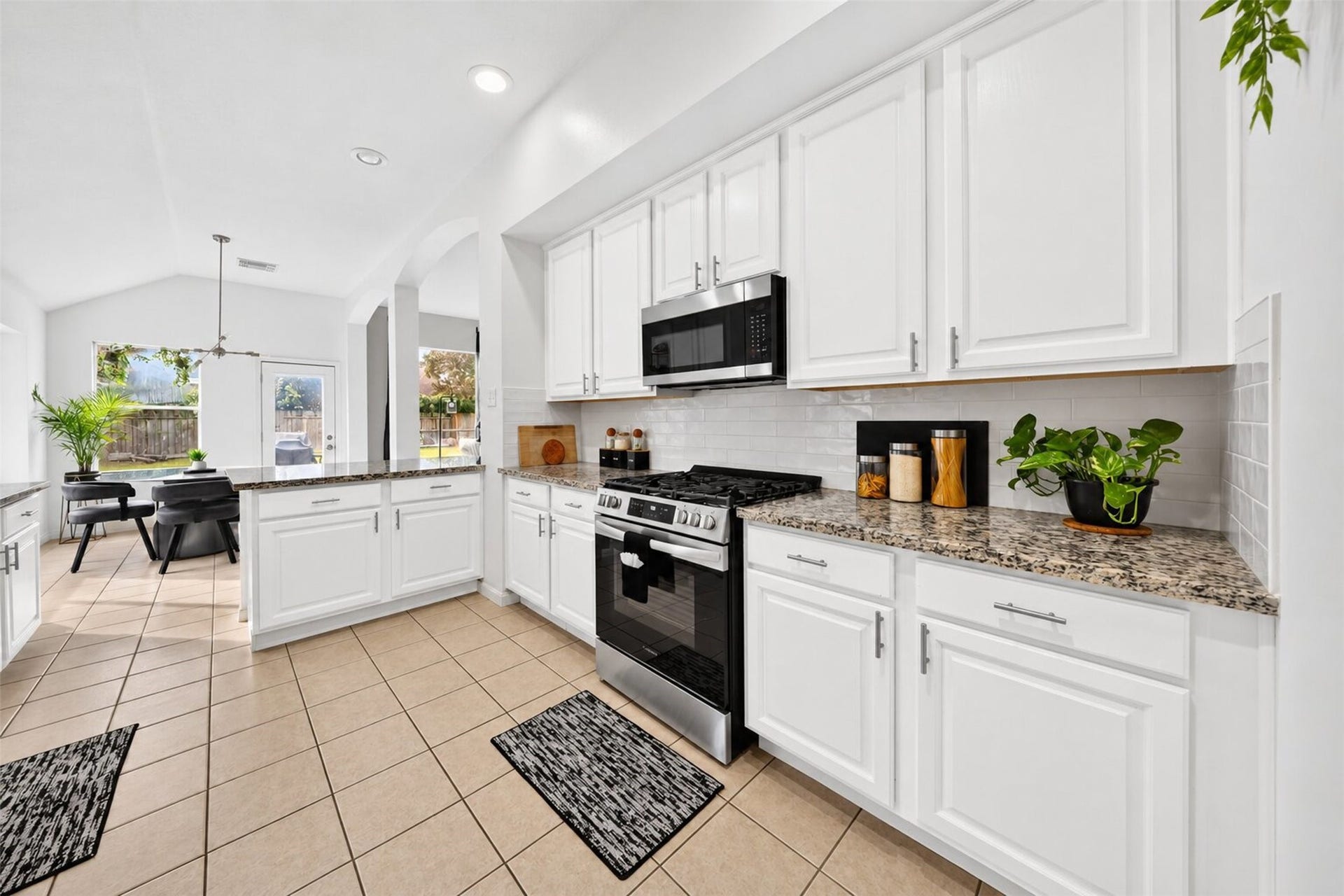 11235 Stoney Meadow Drive, Houston, TX 77095 Updated kitchen with granite counter tops and stainless steel appliances.