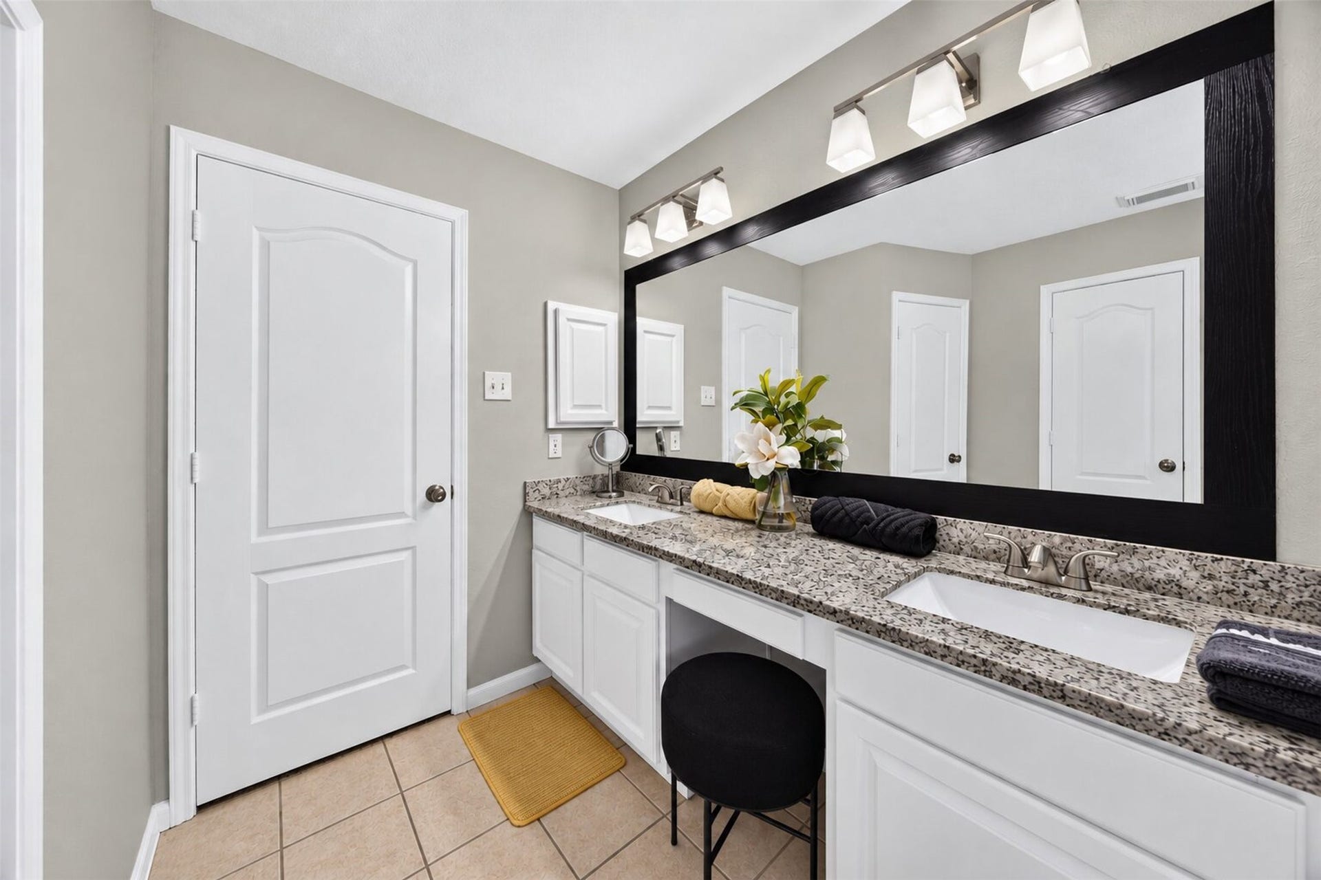 11235 Stoney Meadow Drive, Houston, TX 77095 Large dual sinks and vanity area with granite countertops.