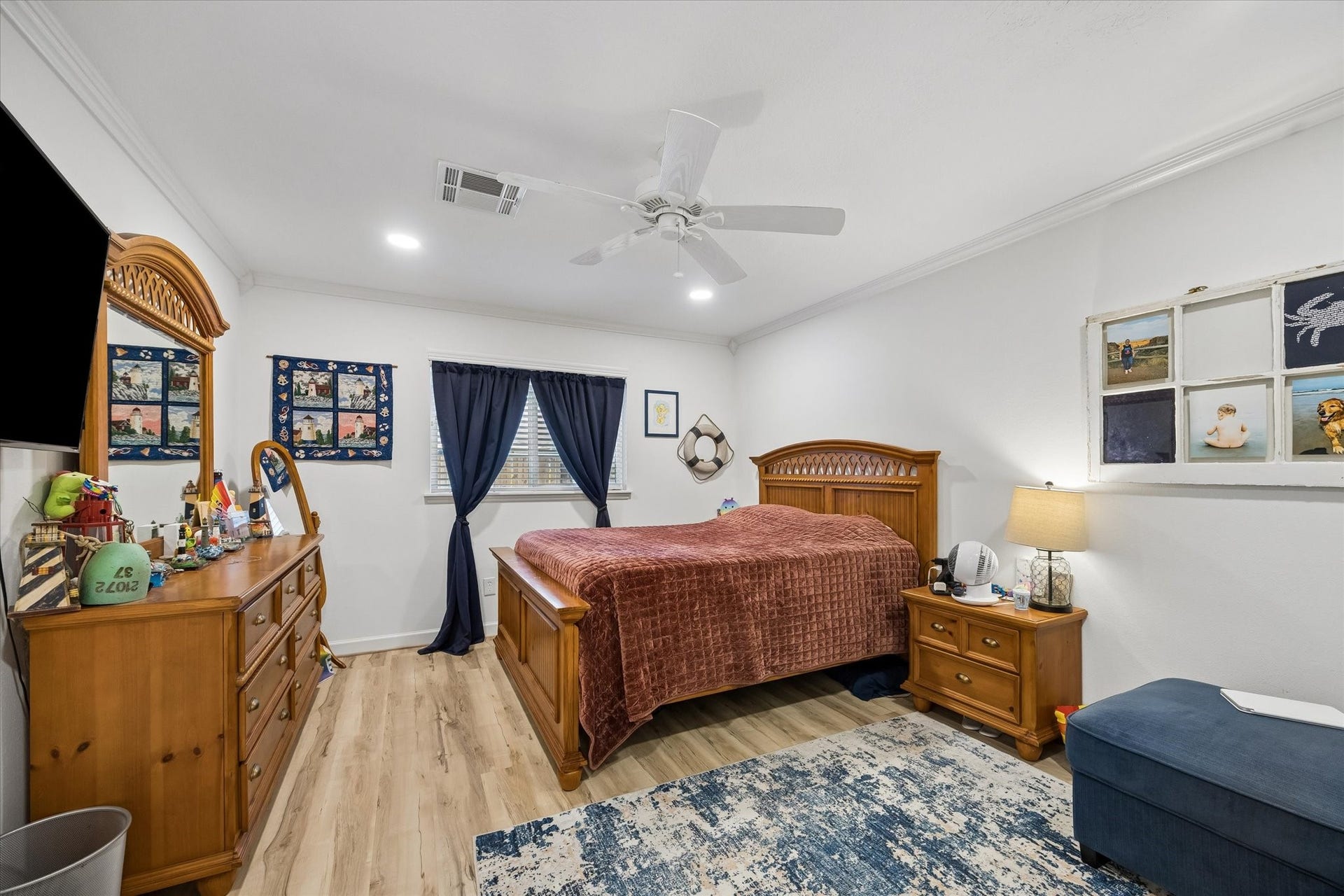 5914 Y Street, Katy, TX 77493 Spacious primary bedroom boasts high-end LVP flooring, upgraded dual pane windows, recessed lighting & luxurious baths with 2 walk-in closets.