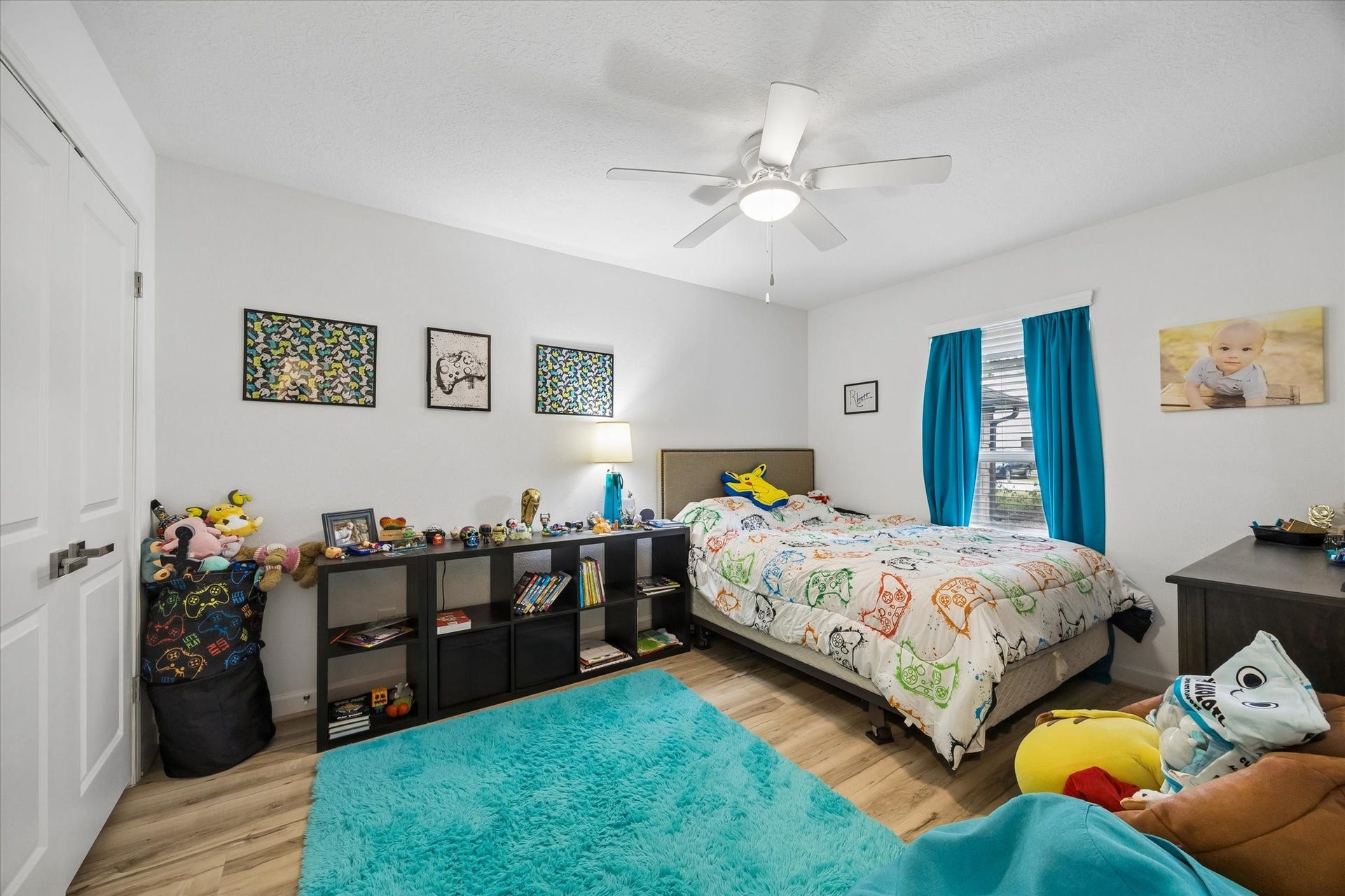 5914 Y Street, Katy, TX 77493 One of three spacious secondary bedrooms, all boasting high-end LVP flooring, upgraded dual pane windows, large closets & ceiling fans!