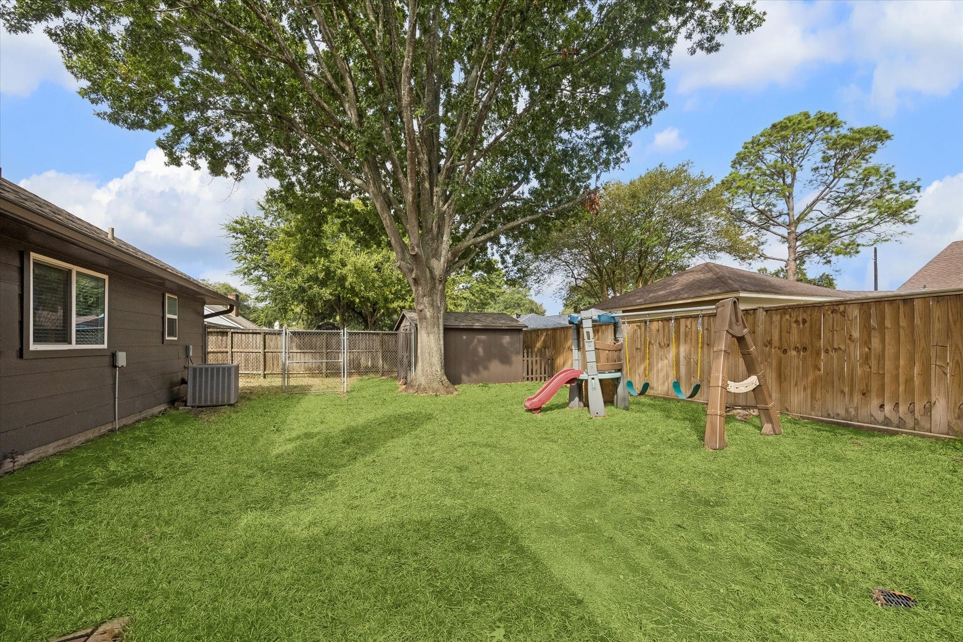 5914 Y Street, Katy, TX 77493 Spacious fenced yard with recent fencing is large enough to accommodate a pool or playset!
