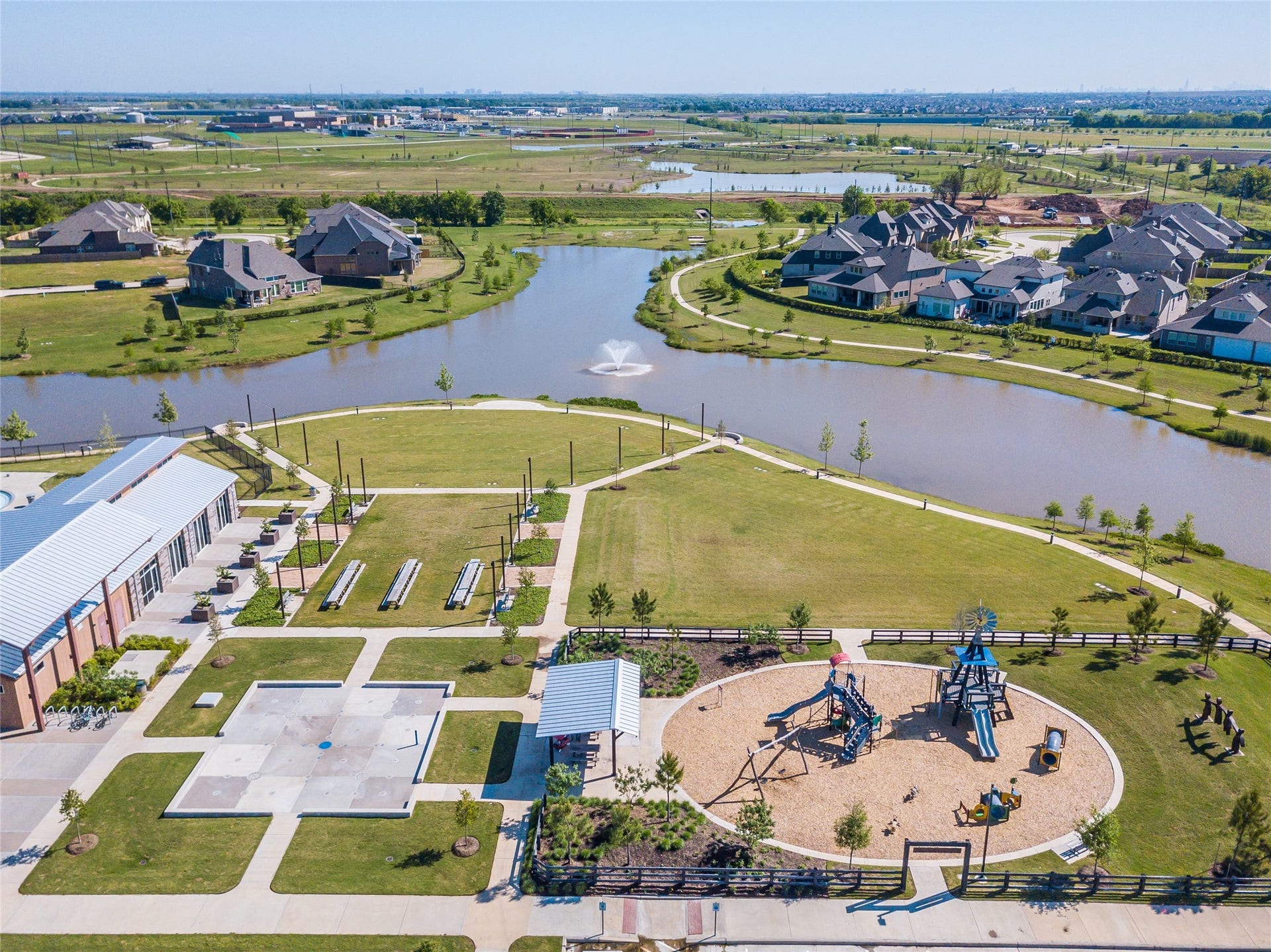 Expansive green spaces, scenic lakes, and thoughtfully designed recreation areas create an active outdoor lifestyle in Harvest Green. Residents enjoy playgrounds, gathering spaces, splash areas, and miles of connected trails woven throughout the communitys lake-lined landscape.