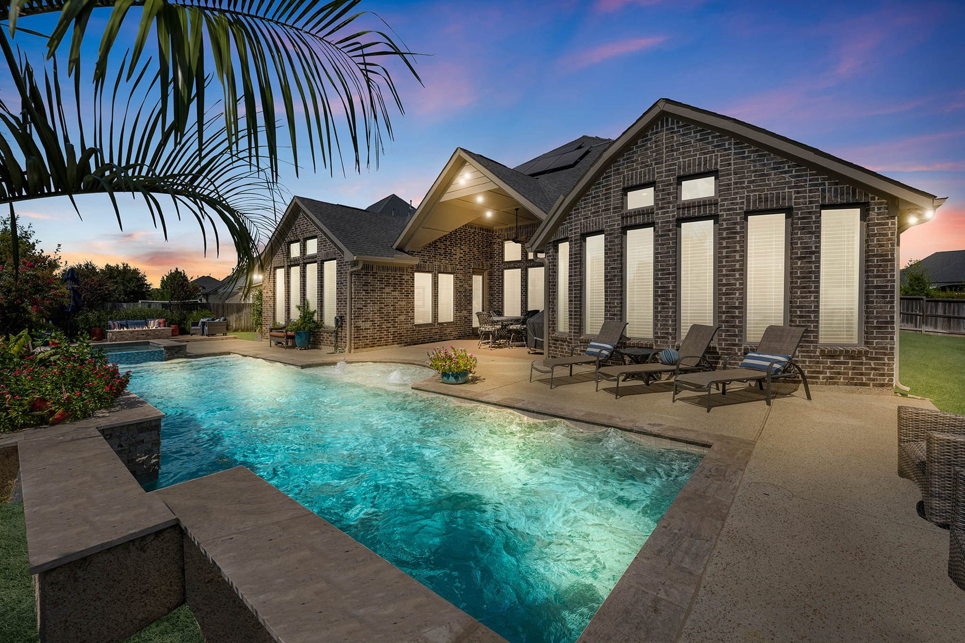 2503 Brazos Trail, Katy, TX 77493 Resort-style backyard with sparkling pool, expansive covered patio & beautiful Coventry design.