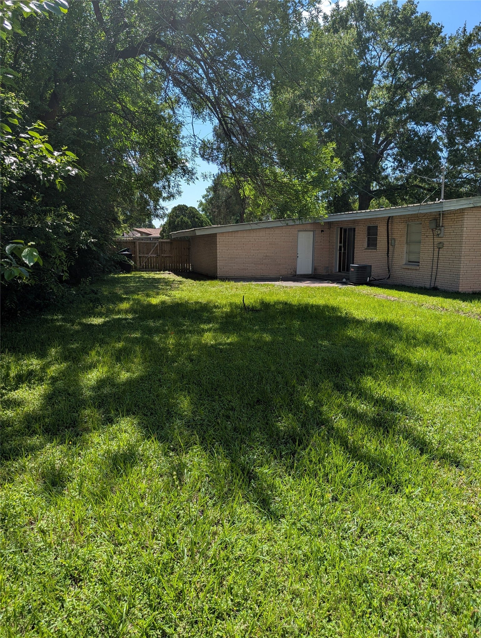146 W Brenda Street, Houston, TX 77076 Back of home. Yard has plenty of space