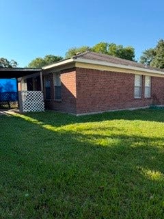 6303 Southwood Court S, Houston, TX 77035 Backyard with covered patio