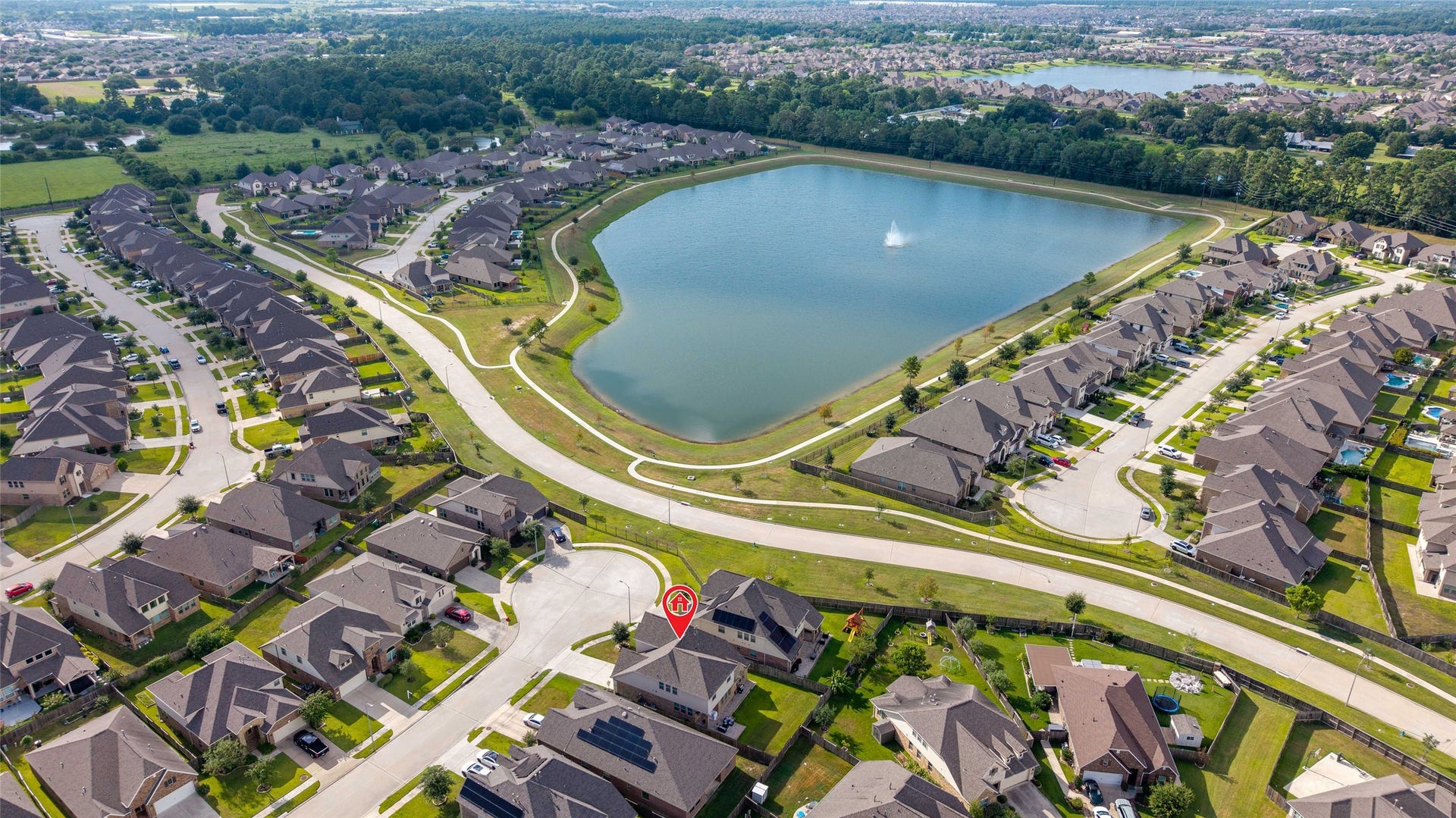 Just steps away from the beautiful neighborhood lake, with paved walking paths.