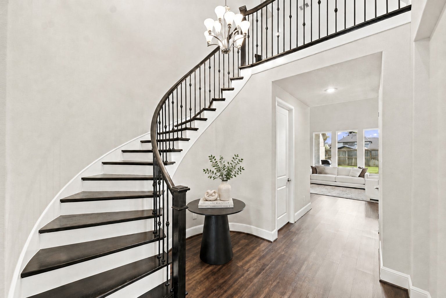 3011 Lantana Trail, Katy, TX 77493 Grand curved staircase and soaring 2-story entry add architectural impact.