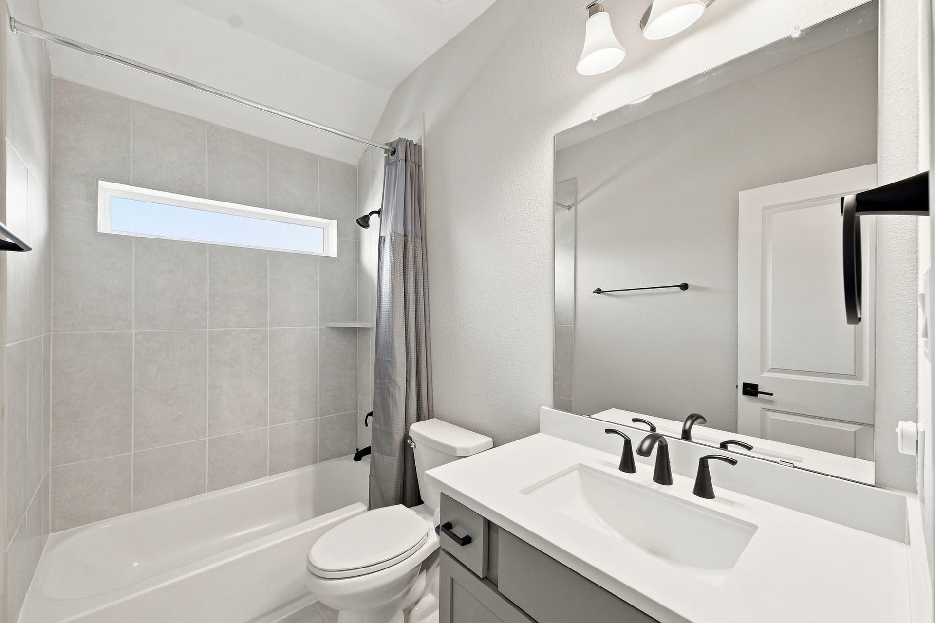 3011 Lantana Trail, Katy, TX 77493 Full bathroom accessible to all on the second floor, but situated between the two bedrooms.