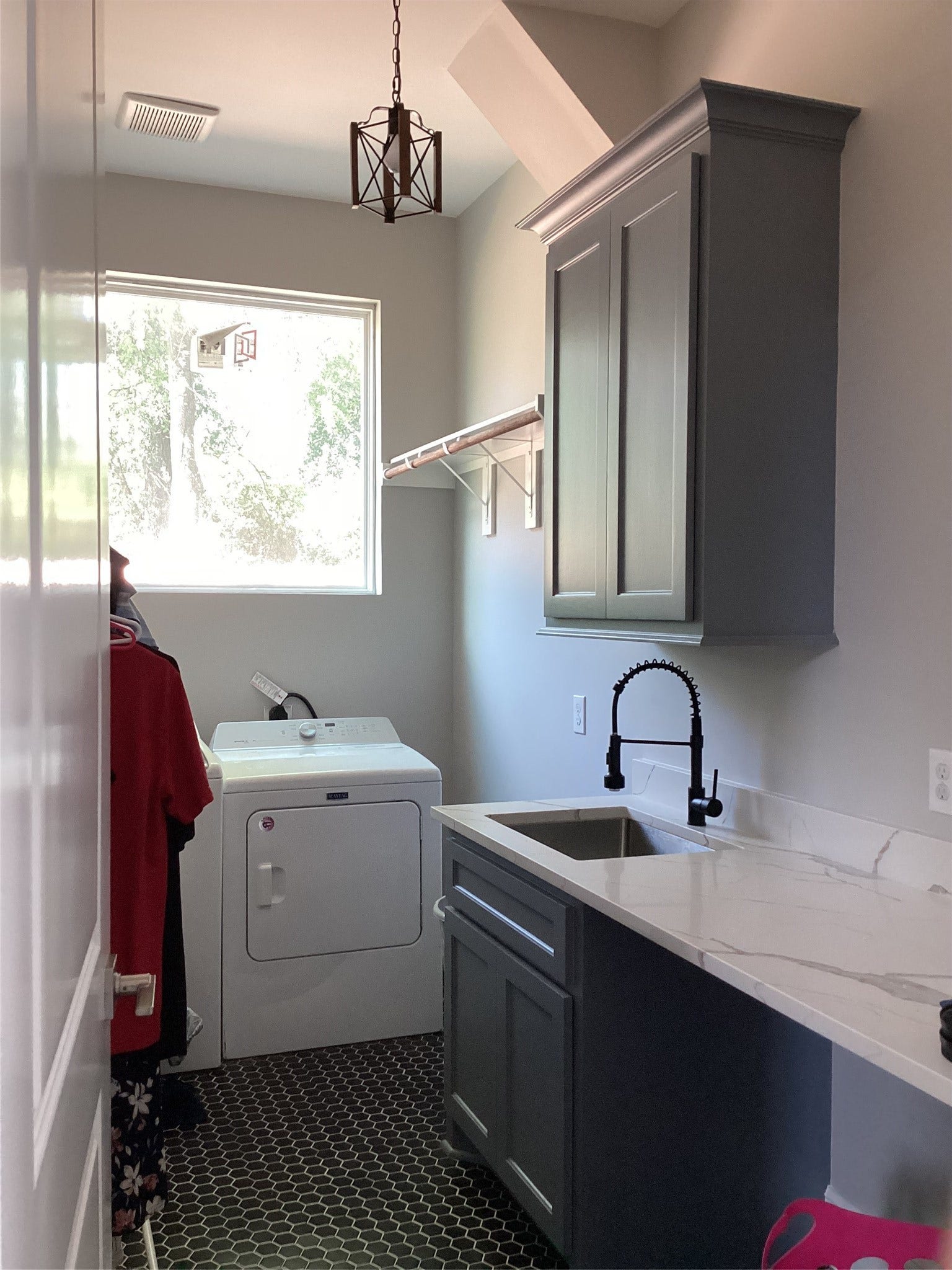 17030 Forest Trail Drive, Channelview, TX 77530 Laundry room with sink and countertop