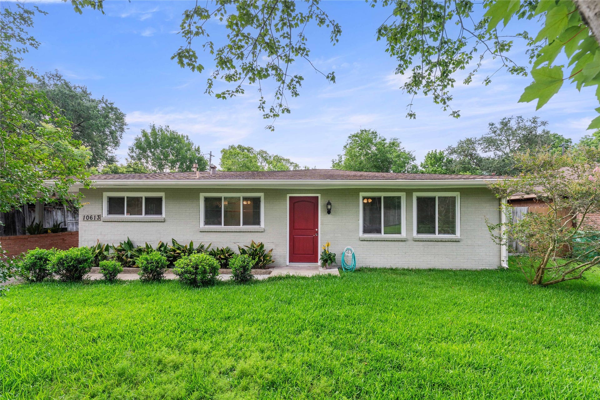 Welcome to 10613 Willowgrove, a mid-century modern home filled with style and charm!  Updated DOUBLE-PANED energy efficient windows run throughout the house.