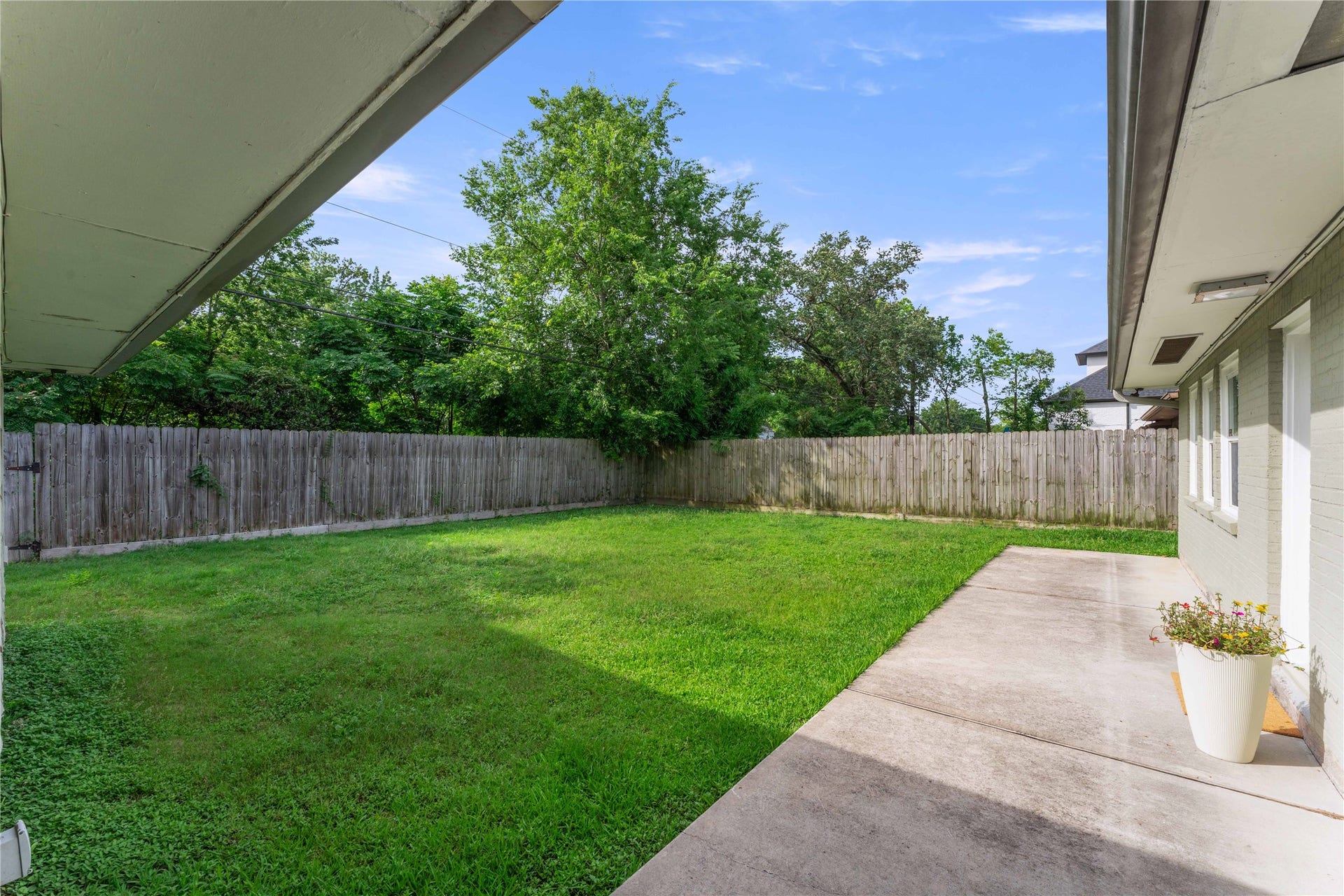 This spacious backyard offers great PRIVACY, NO BACK NEIGHBORS!  Use the second patio as additional entertaining space.  The lawn provides plenty of room for people and pets to play. Create your own outdoor oasis!!
