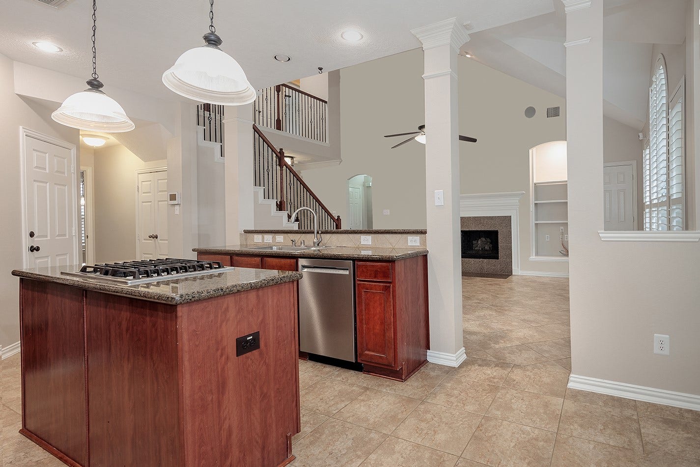 79 FRENCH OAKS, The Woodlands, TX 77382 Kitchen Overlooking the Family Room