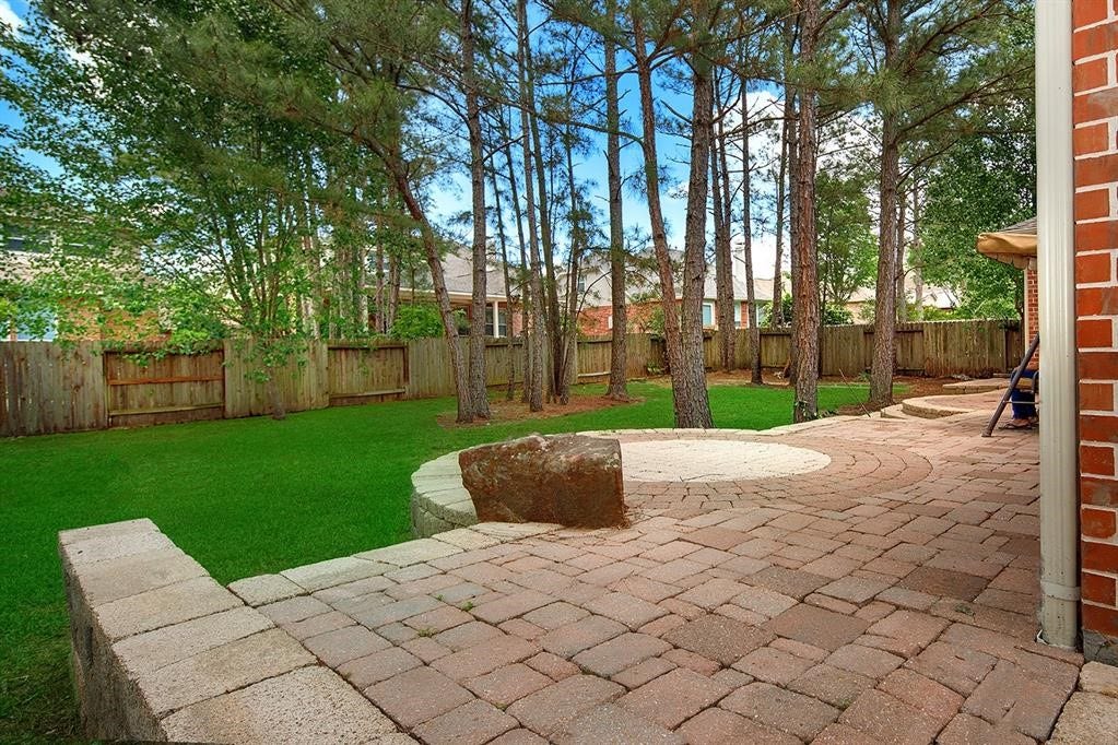 79 FRENCH OAKS, The Woodlands, TX 77382 Expansive Backyard Patio