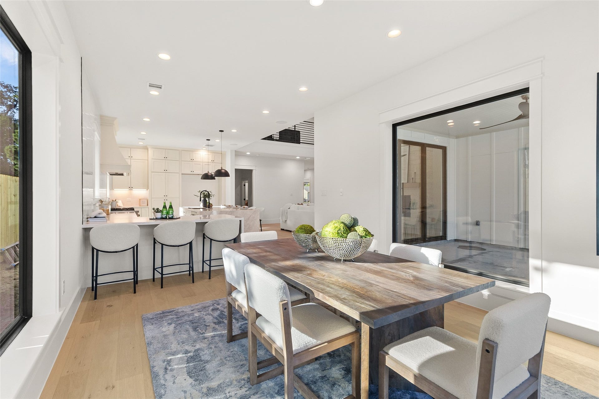 Family dinners and weekend gatherings flow effortlessly between your dining area, gourmet kitchen, and covered outdoor living space.