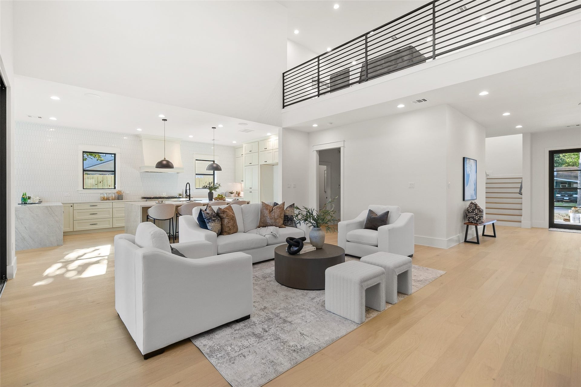 Everyday life flows effortlessly through this bright, open-concept layout where the living room, kitchen, and dining spaces are all connected.