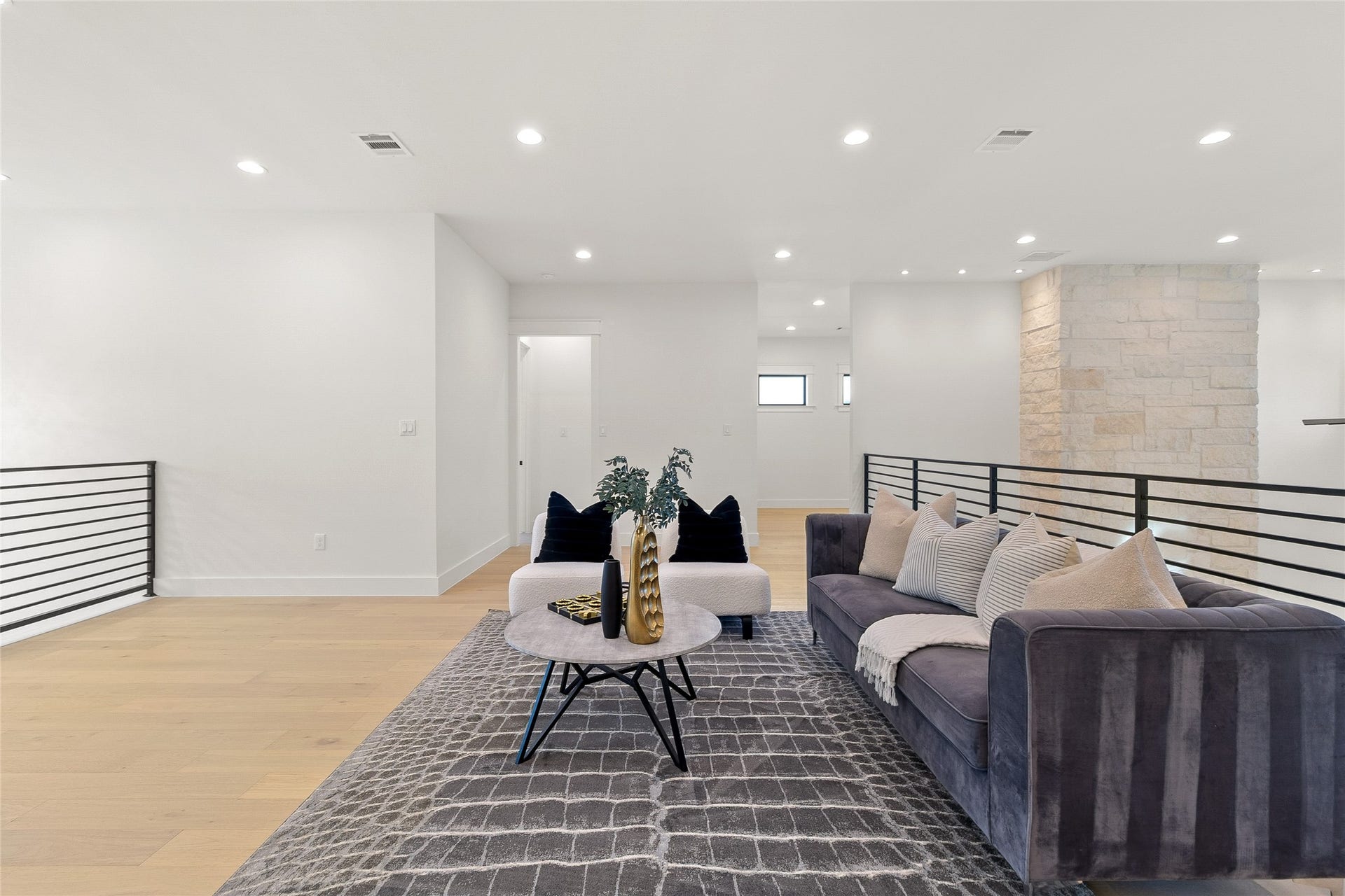 Your upstairs lounge provides the perfect flex space for movie nights, a home office, or a comfortable place to gather with family and friends.