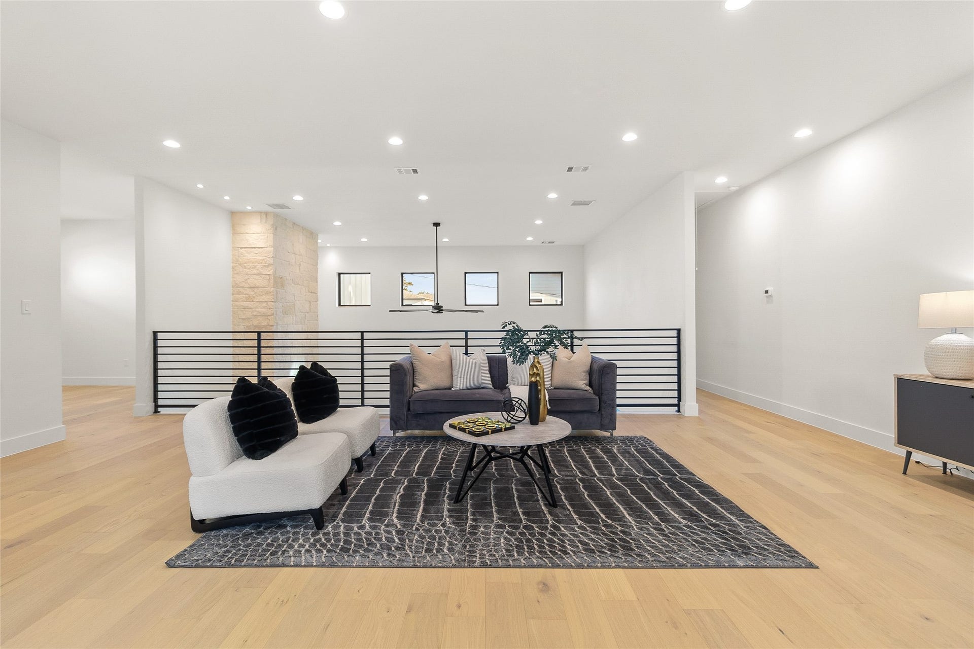 Upstairs, your spacious game room offers endless possibilities for movie nights, game days, or a relaxing second living area.
