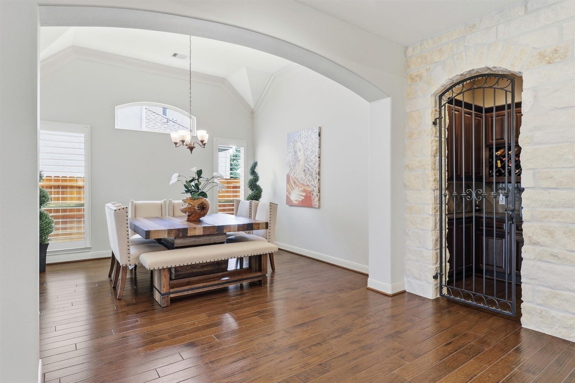 27114 Ashford Sky Lane, Katy, TX 77494 View of spacious dining room with wine grotto surrounded by gorgeous Austin chalk stone.