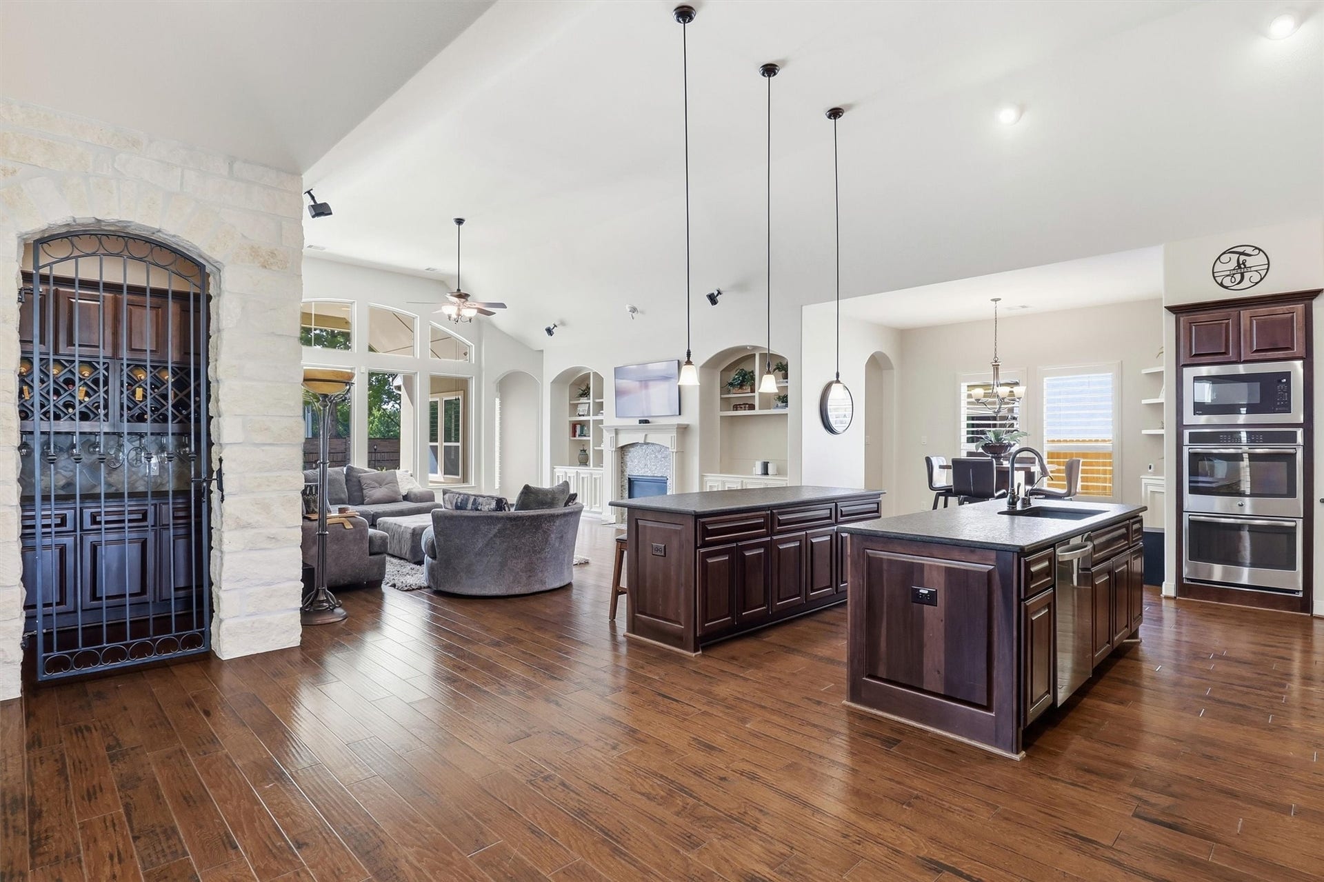 27114 Ashford Sky Lane, Katy, TX 77494 The ultimate open floorplan features a double-island kitchen and a wine grotto. Entertaining just got easier!