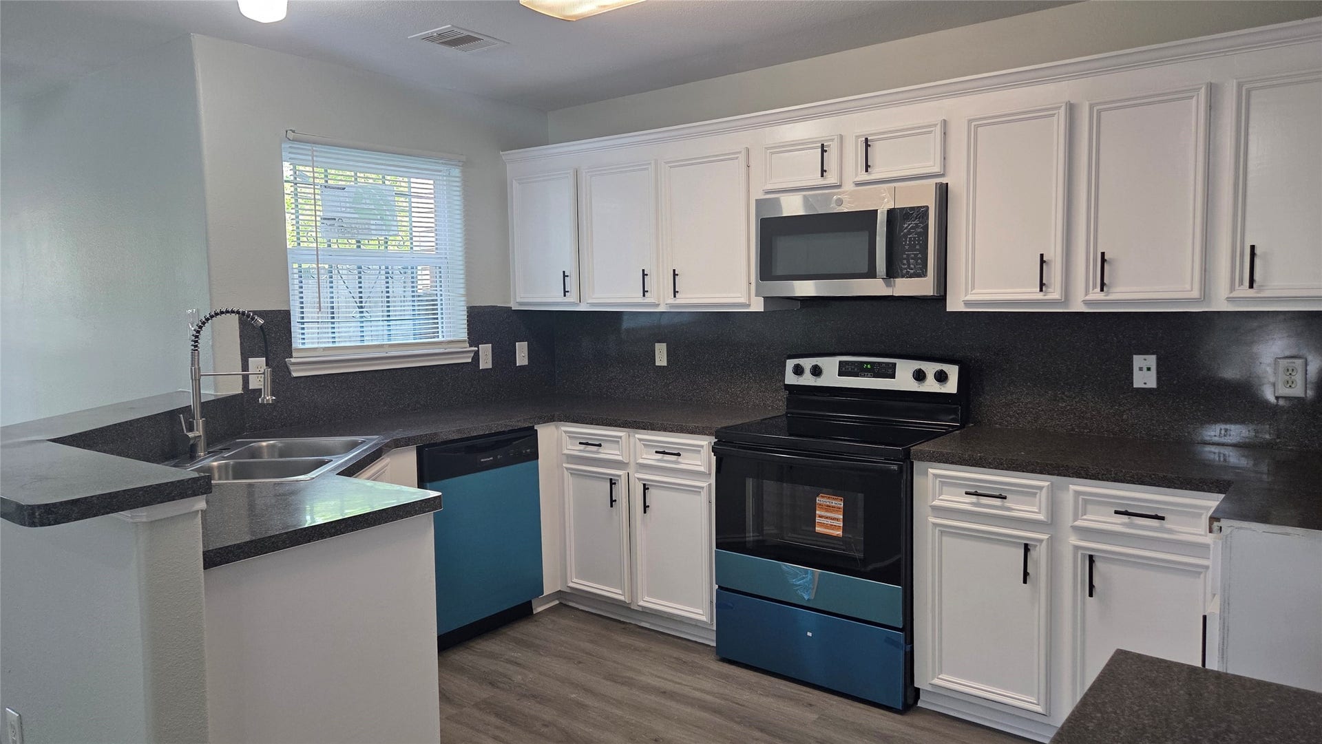 Unit A - Kitchen with New Stainless Steel Appliances