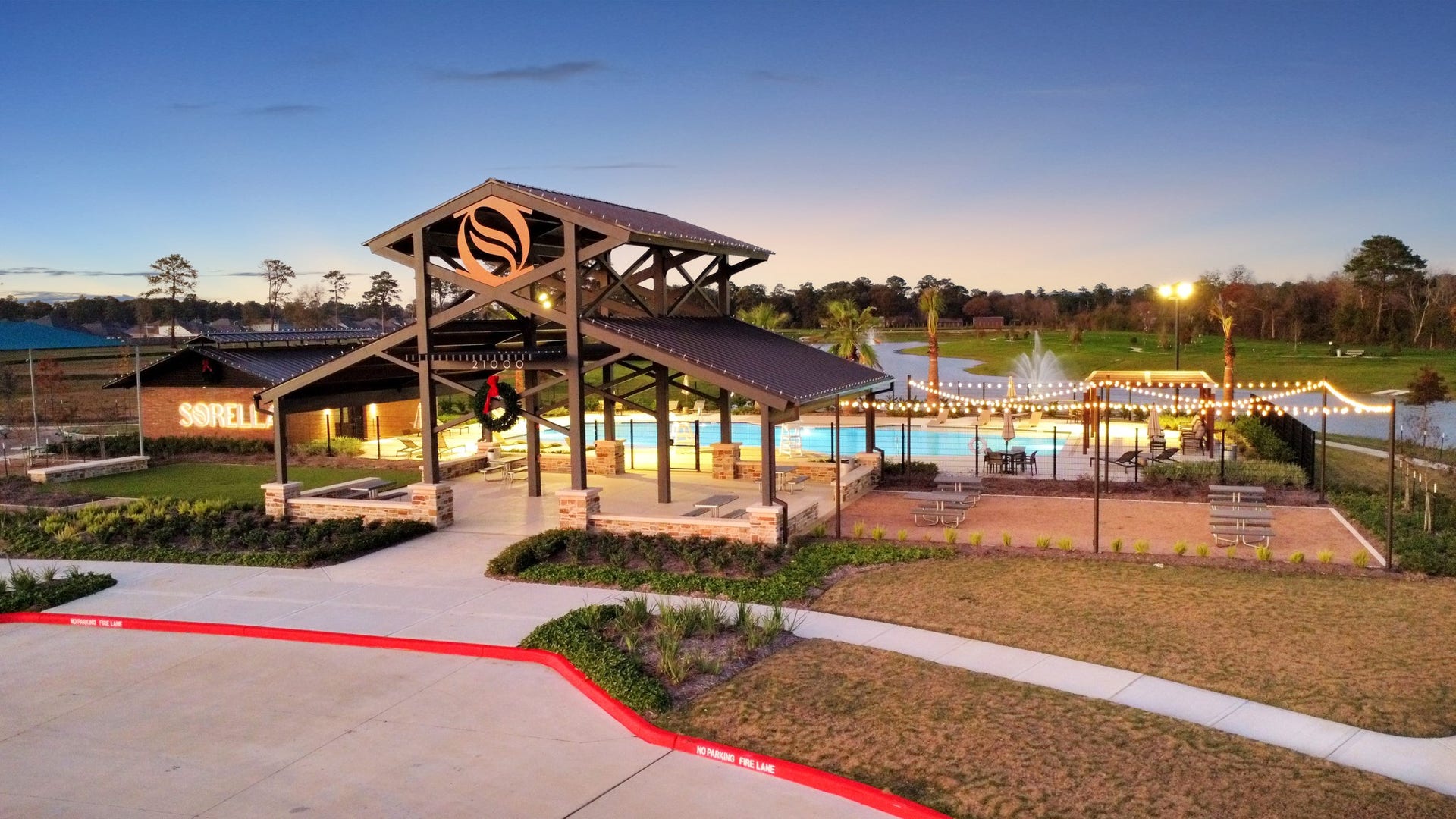 21434 Gazania Daisy Lane, Tomball, TX 77377 The community features serene lakeside walking trails that wind around a picturesque pond, perfect for evening strolls or morning jogs.