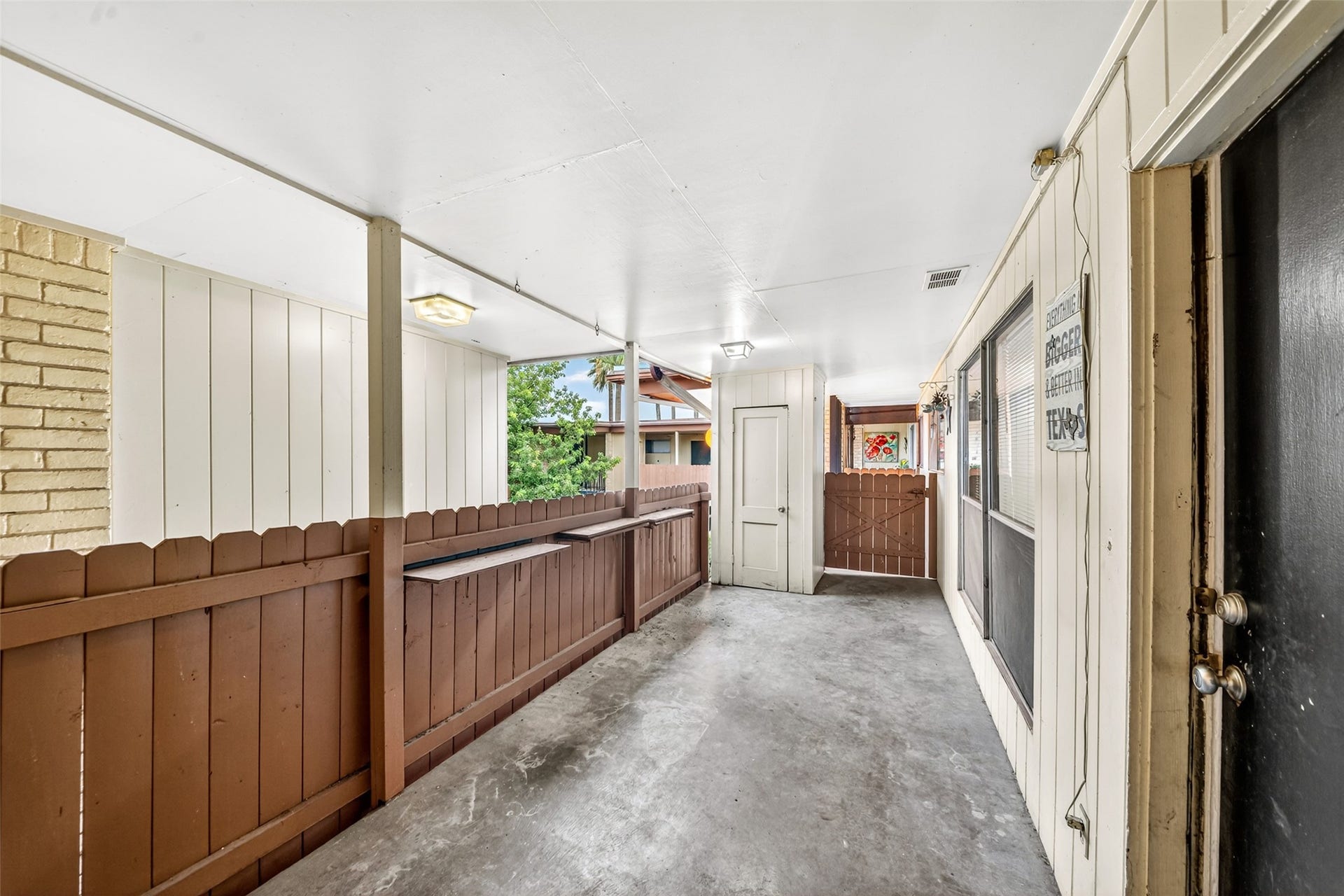 Patio is private and plenty of space for a full set of outdoor furniture, and a storage closet