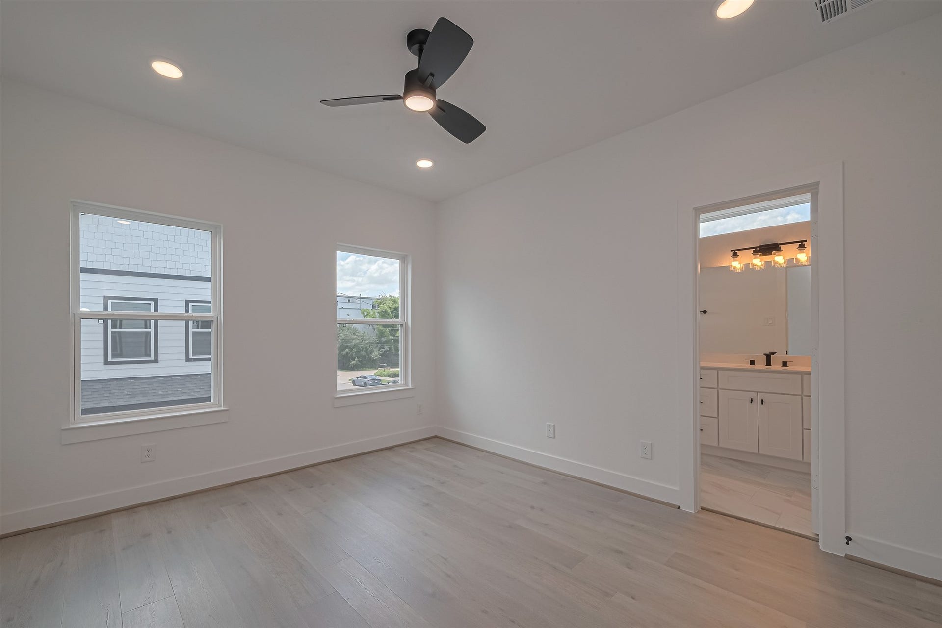 1350 W 24th Street, Houston, TX 77008 Master bedroom view showcasing the natural light and generous space.