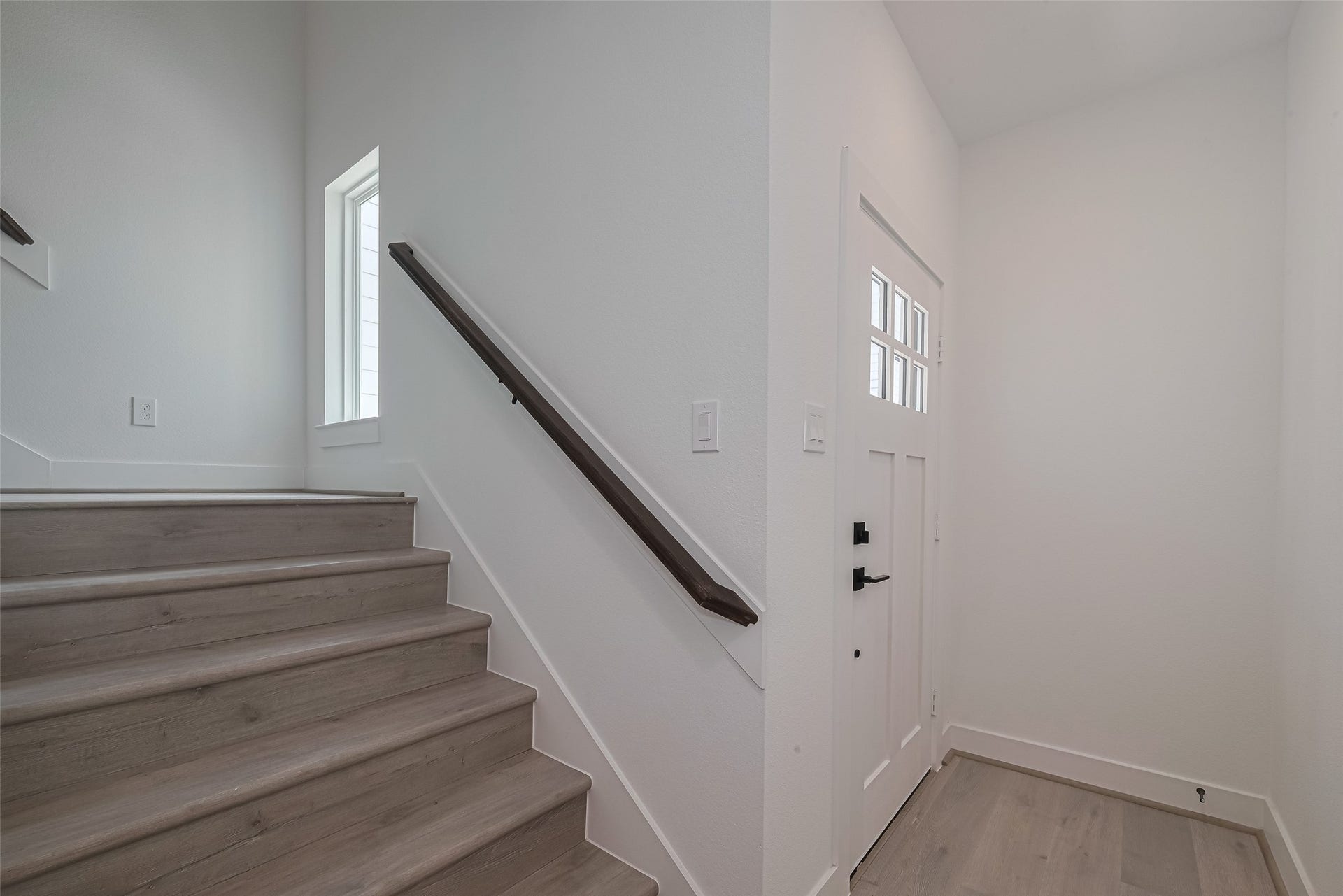 1350 W 24th Street, Houston, TX 77008 Interior entryway with stairs leading to the main living area.