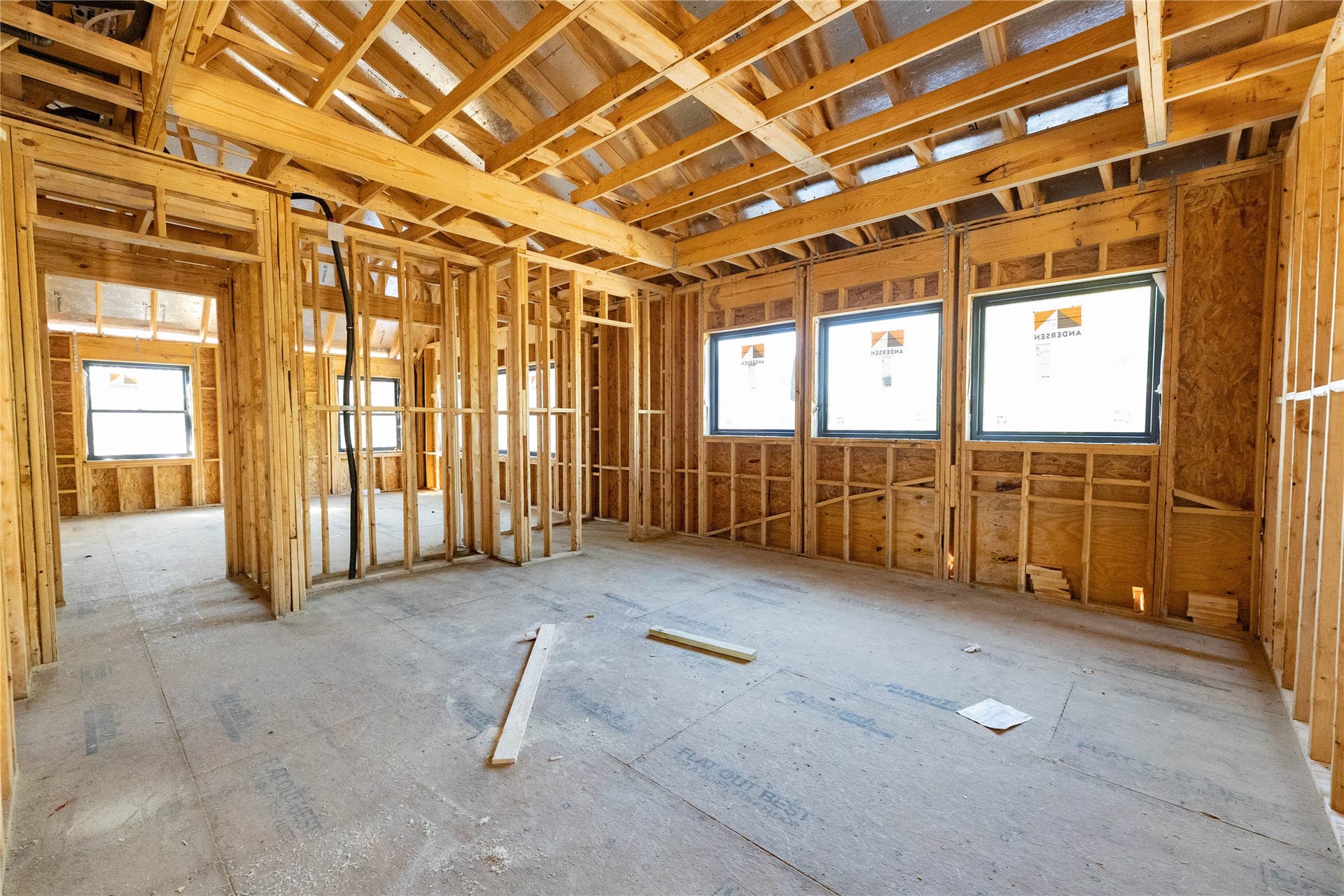 2nd Floor Game Room is pre-wired for audio and offers 3 large Andersen windows to let natural light in.  Construction Photo taken 10/22/26