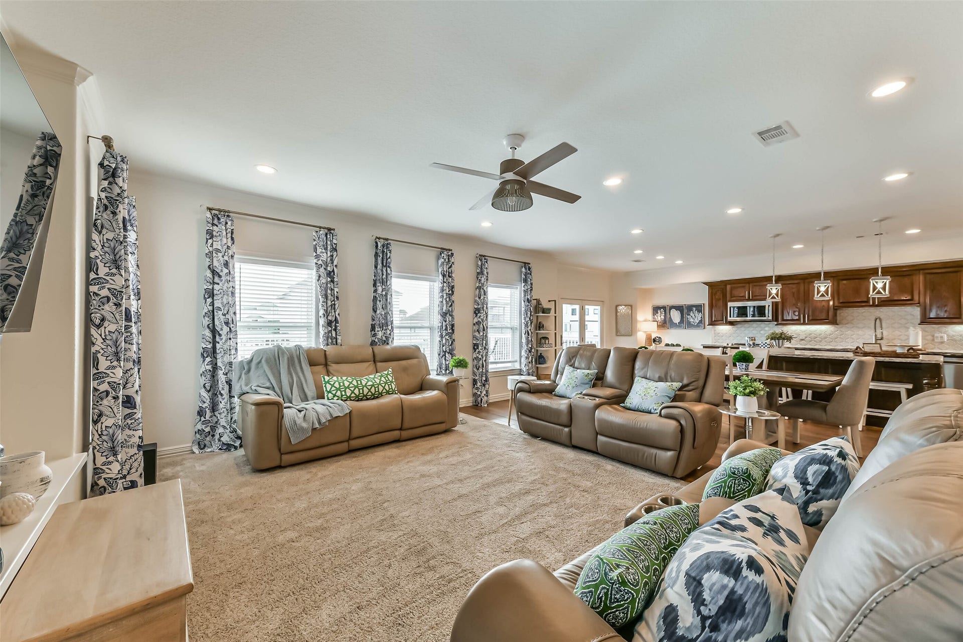 429 Jeanie Lynne Circle, Tiki Island, TX 77554 Soaring ceilings and expansive windows frame incredible waterfront views.