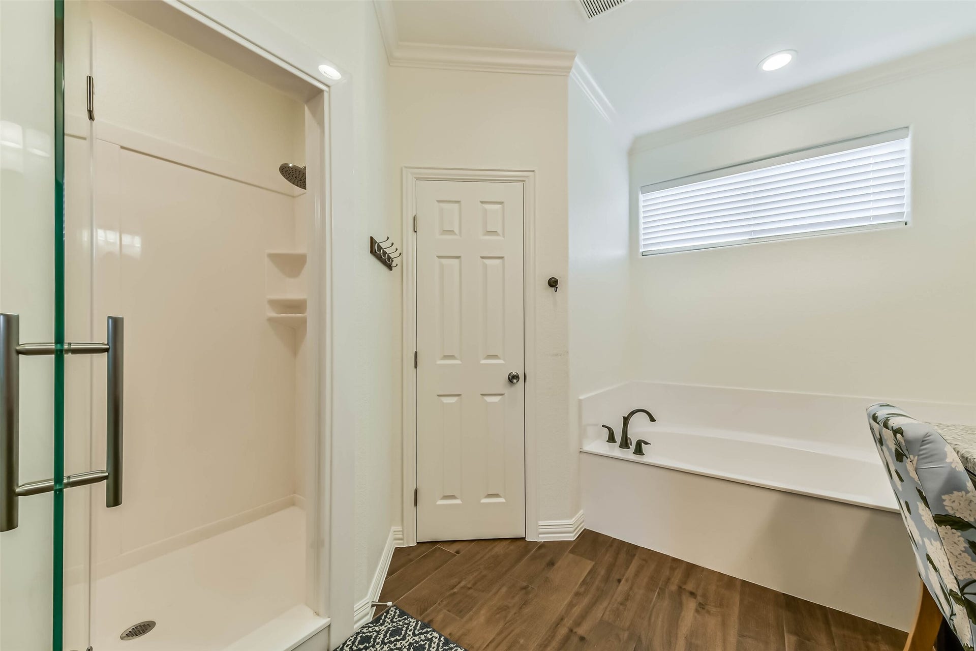 429 Jeanie Lynne Circle, Tiki Island, TX 77554 Clean, neutral finishes and durable flooring create a bright and practical bathroom space ideal for everyday use.