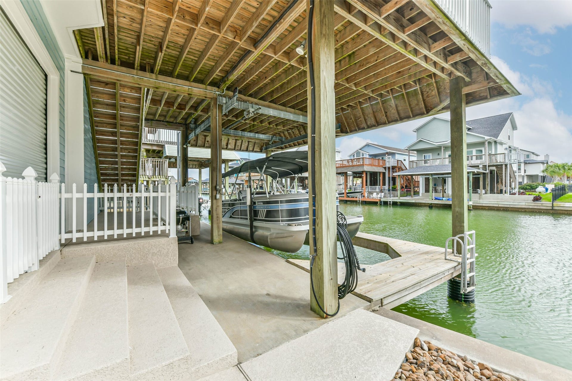 429 Jeanie Lynne Circle, Tiki Island, TX 77554 Direct canal access makes boating and fishing part of everyday life.