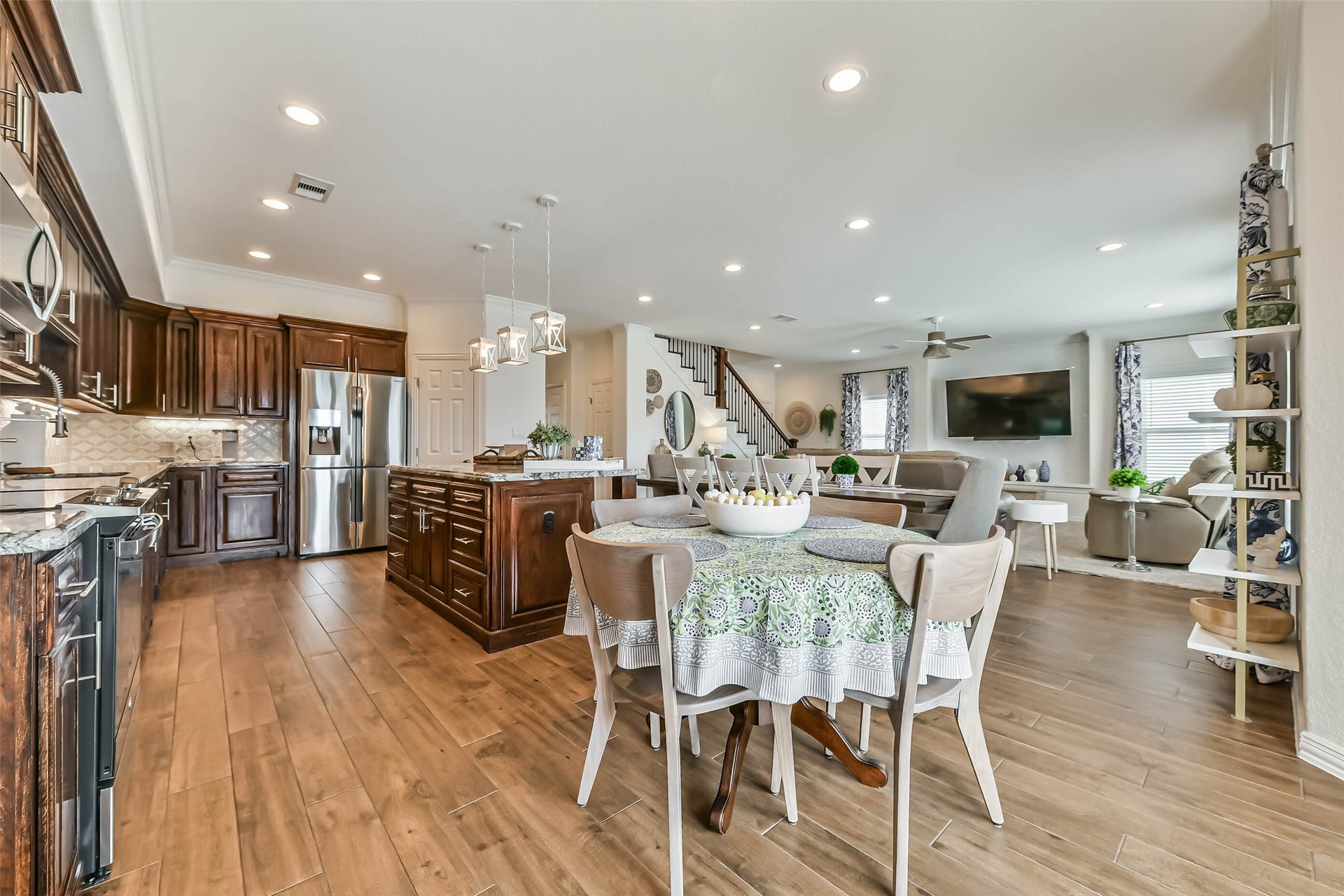 429 Jeanie Lynne Circle, Tiki Island, TX 77554 Open-concept design connects kitchen, dining, and living areas for effortless entertaining.