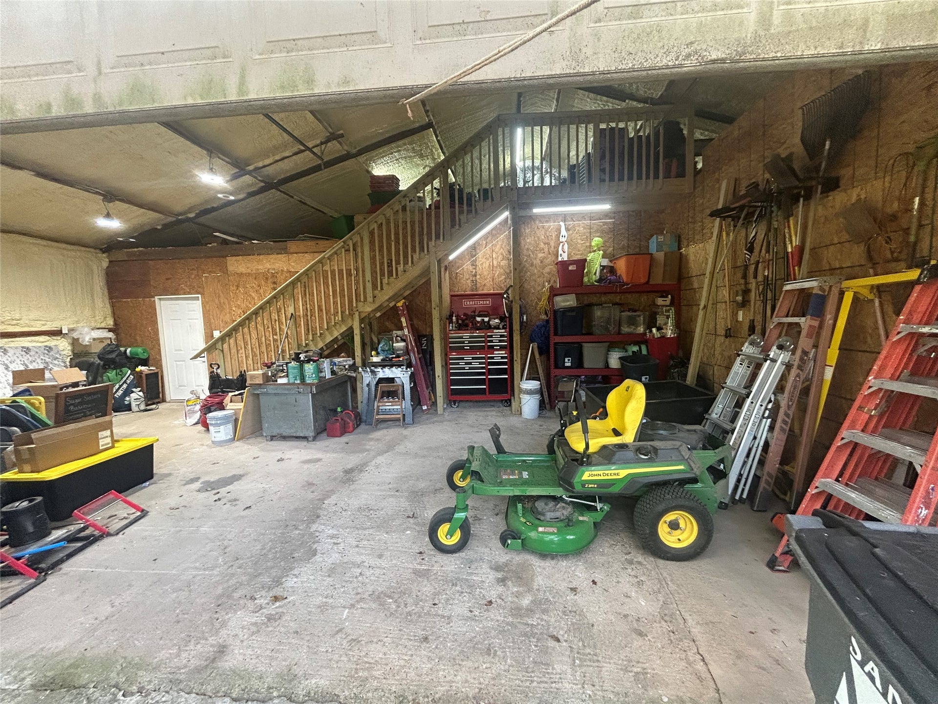 The garage area with roll up door